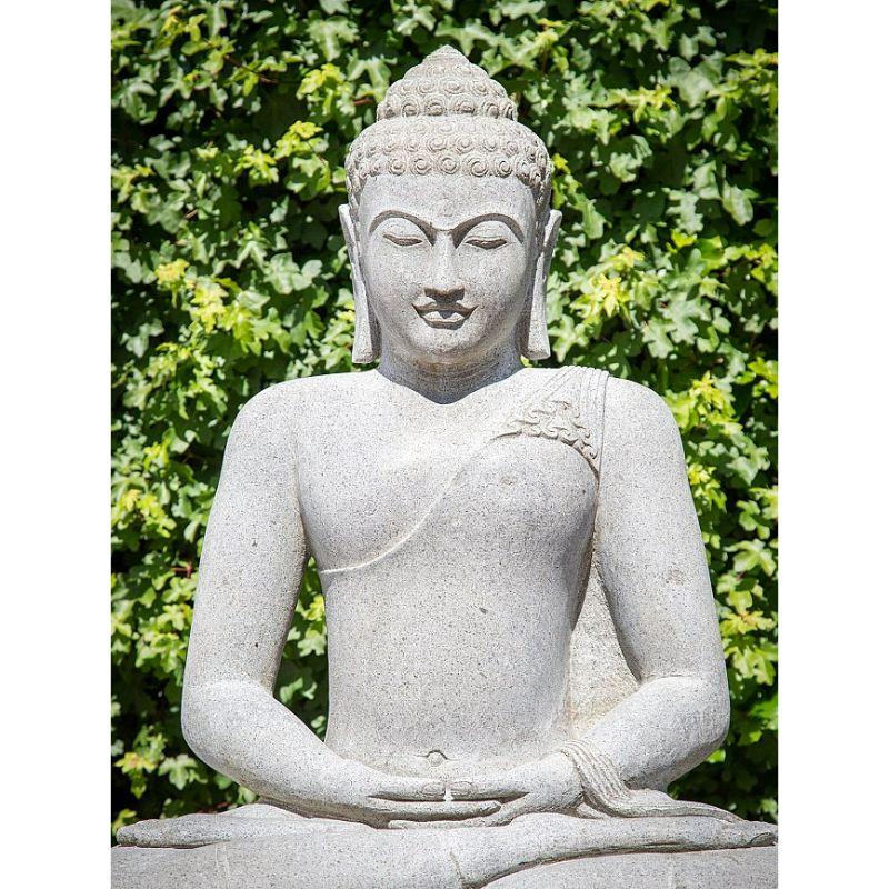 Material: Andesite stone
Material: wood
100,5 cm high 
68,5 cm wide and 47 cm deep
Andesite is a very hard vulcanic stone
Dhyana mudra
Originating from Indonesia
Newly hand carved from a large block of Andesite stone
Can be shipped