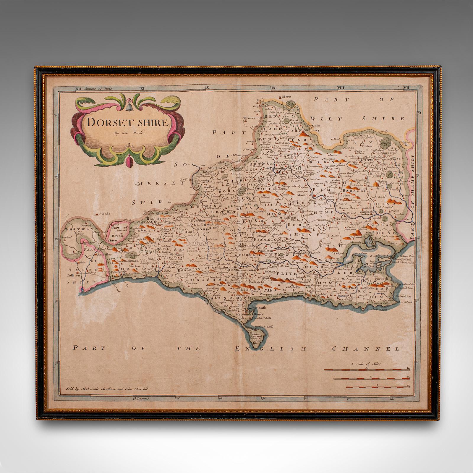 Il s'agit d'une carte ancienne du Dorset. Gravure d'atlas anglaise encadrée d'intérêt cartographique par Robert Morden, datant de la fin du XVIIe siècle ou plus tard.

Superbe lithographie du comté de Dorset et de ses détails, parfaite pour
