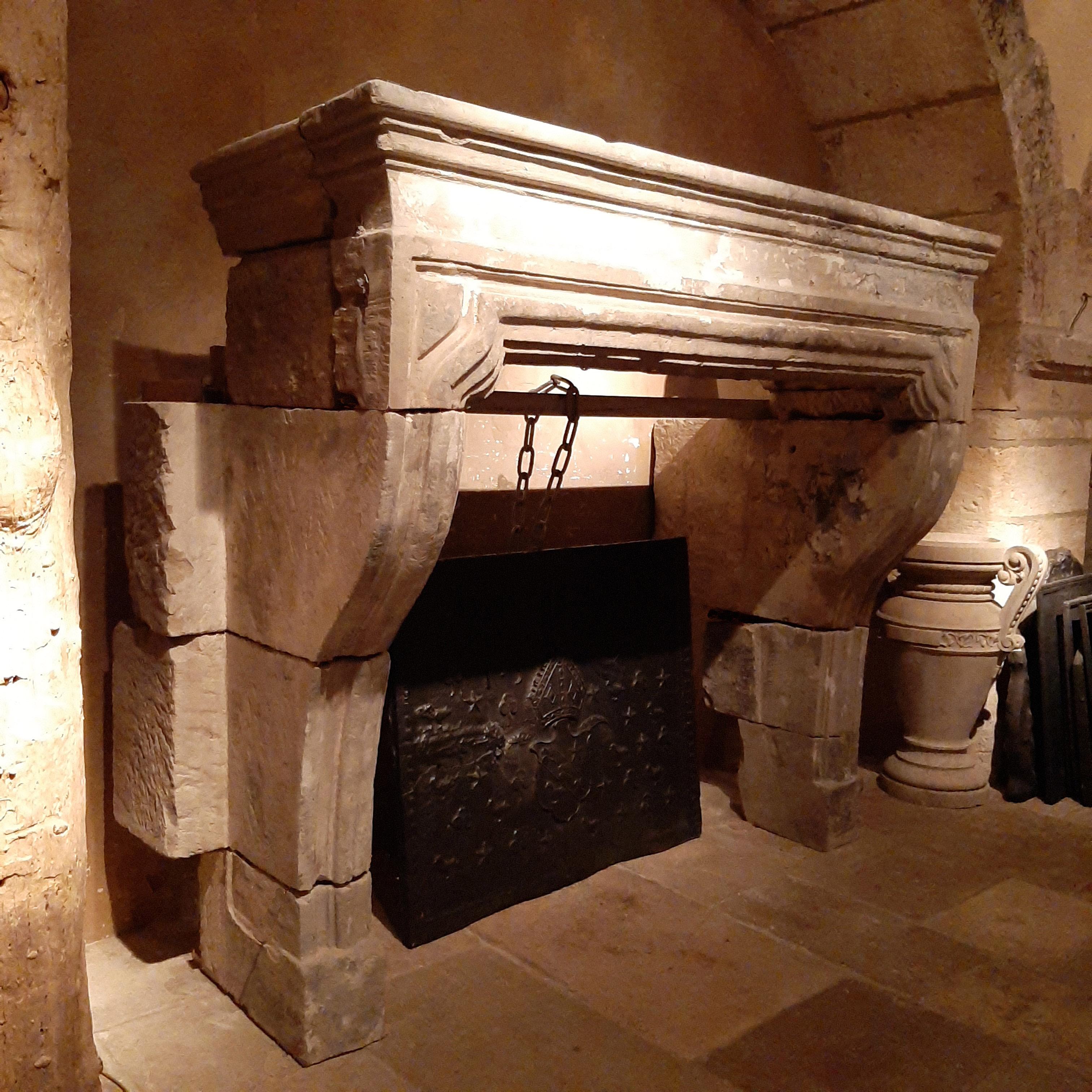 large limestone fireplace