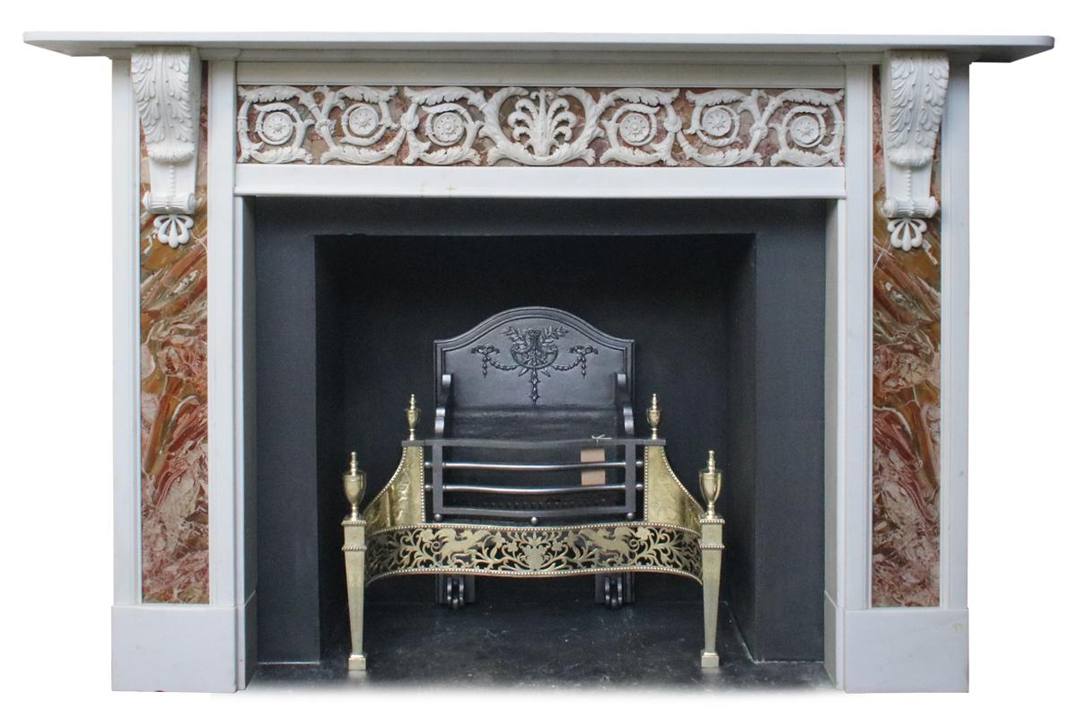 Rare and very large 18th century George III statuary white marble fire surround. Fully restored, the legs and frieze are inset with bookmatched panels of Sicilian jasper. The legs terminate with beautiful corbels carved with acanthus and anthemion