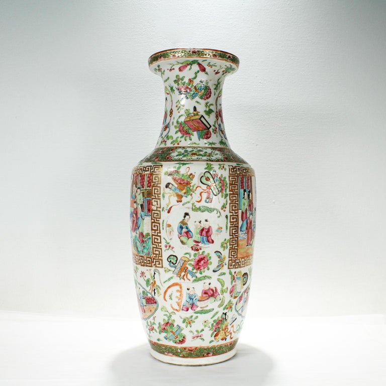 A fine antique large Chinese porcelain vase.

In the Rose Mandarin (Famille Rose) style.
 
Decorated throughout with with various detailed scenes of people & plants. The body of the vase is primarily people, and from the neck upwards is