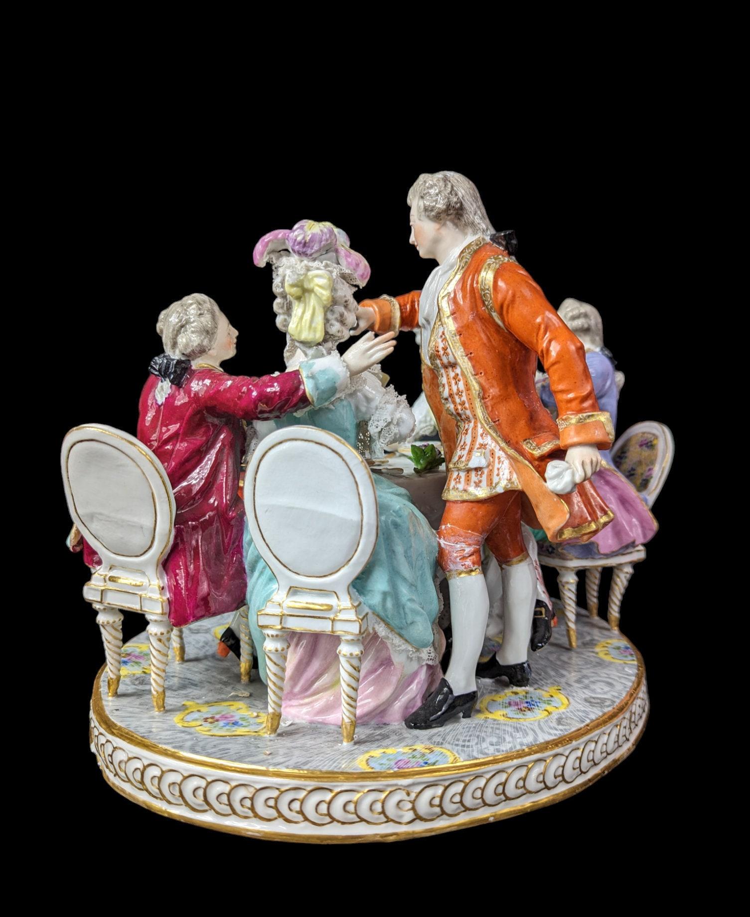 This exquisite Large Antique 19th Century Edme Samson Porcelain Drinking Party Figurine Scene is a true masterpiece of porcelain art. Standing 10 inches tall and 12 inches in diameter, this impressive piece is a testament to the exceptional skill