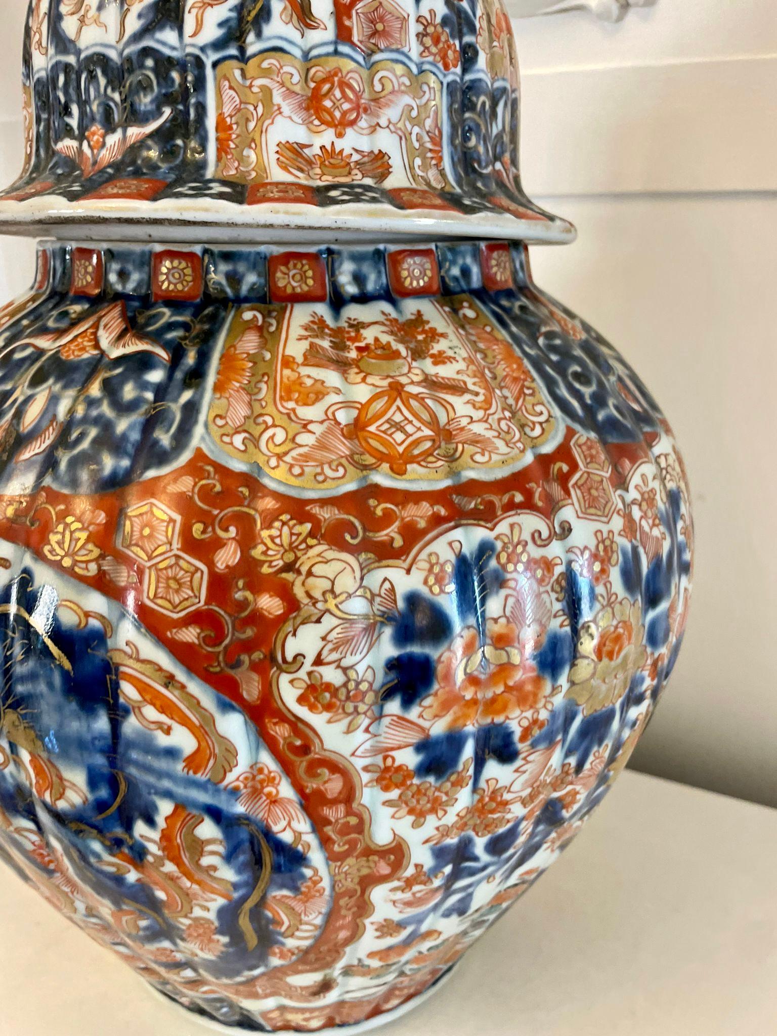 Large antique 19th century quality Imari lidded vase boasting a dog of foo to the lid and wonderful hand painted decoration in red, blue, white and gold colours

A spectacular example of desirable proportions in perfect original