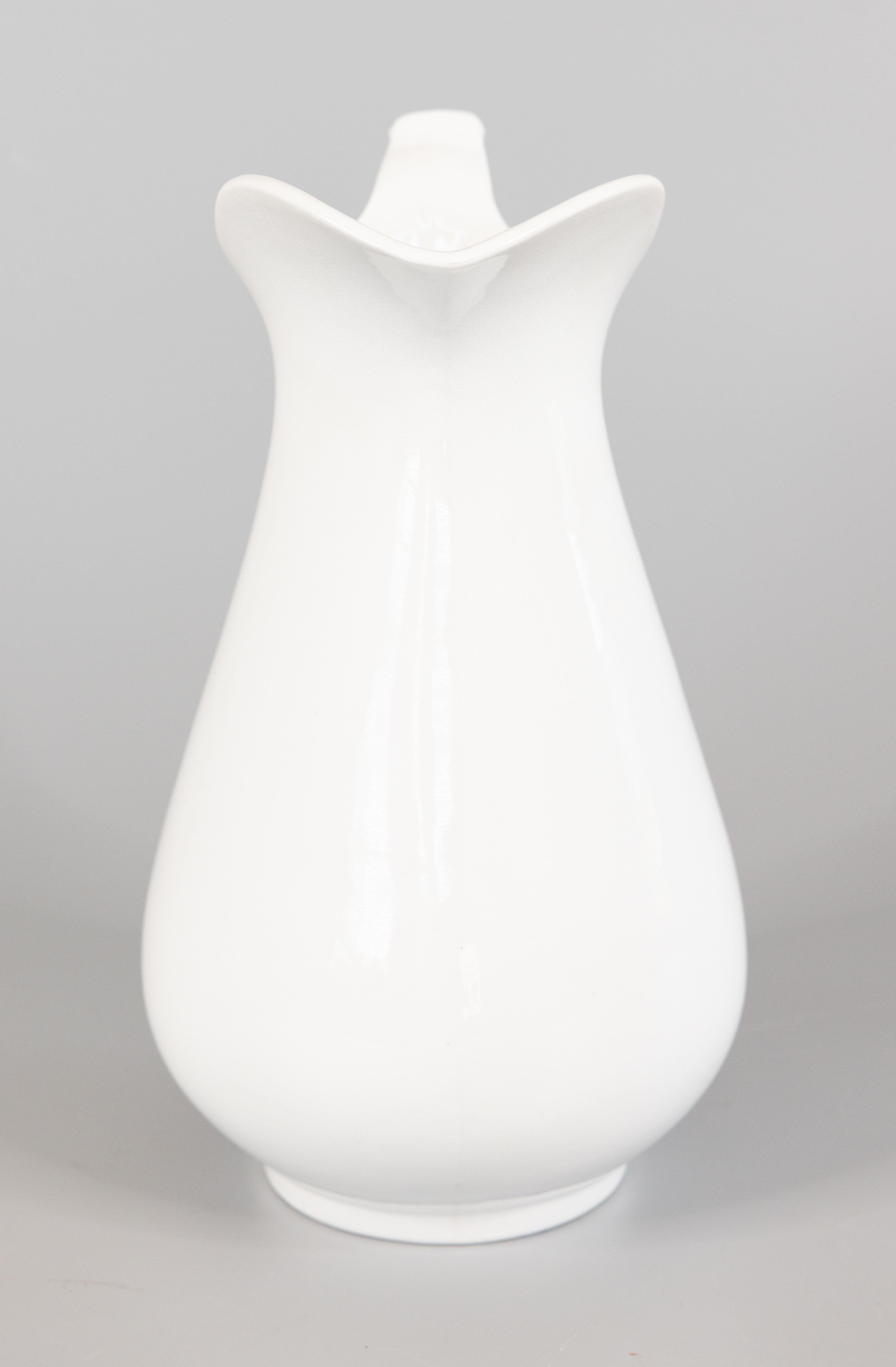 white ironstone pitchers