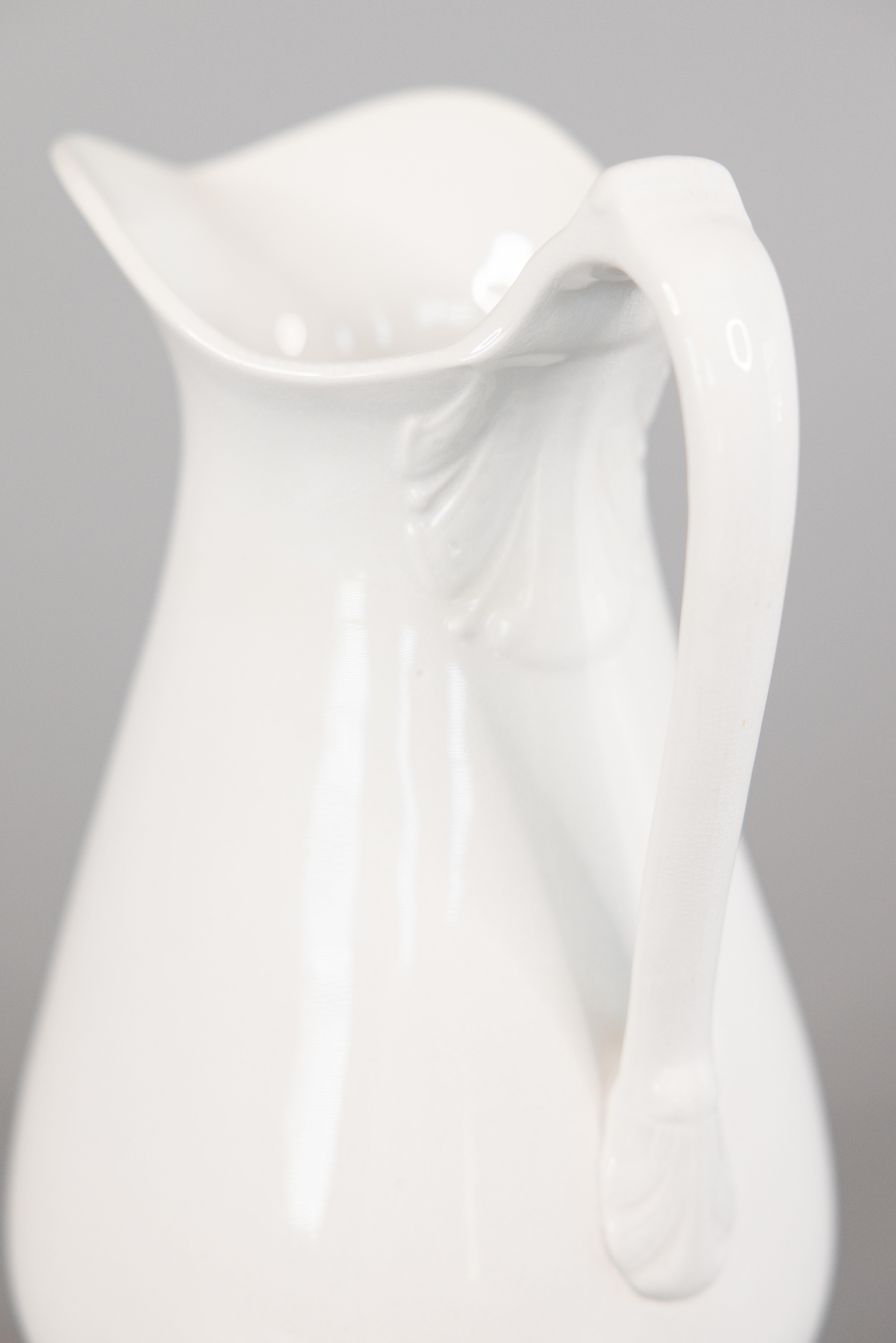 antique white pitcher