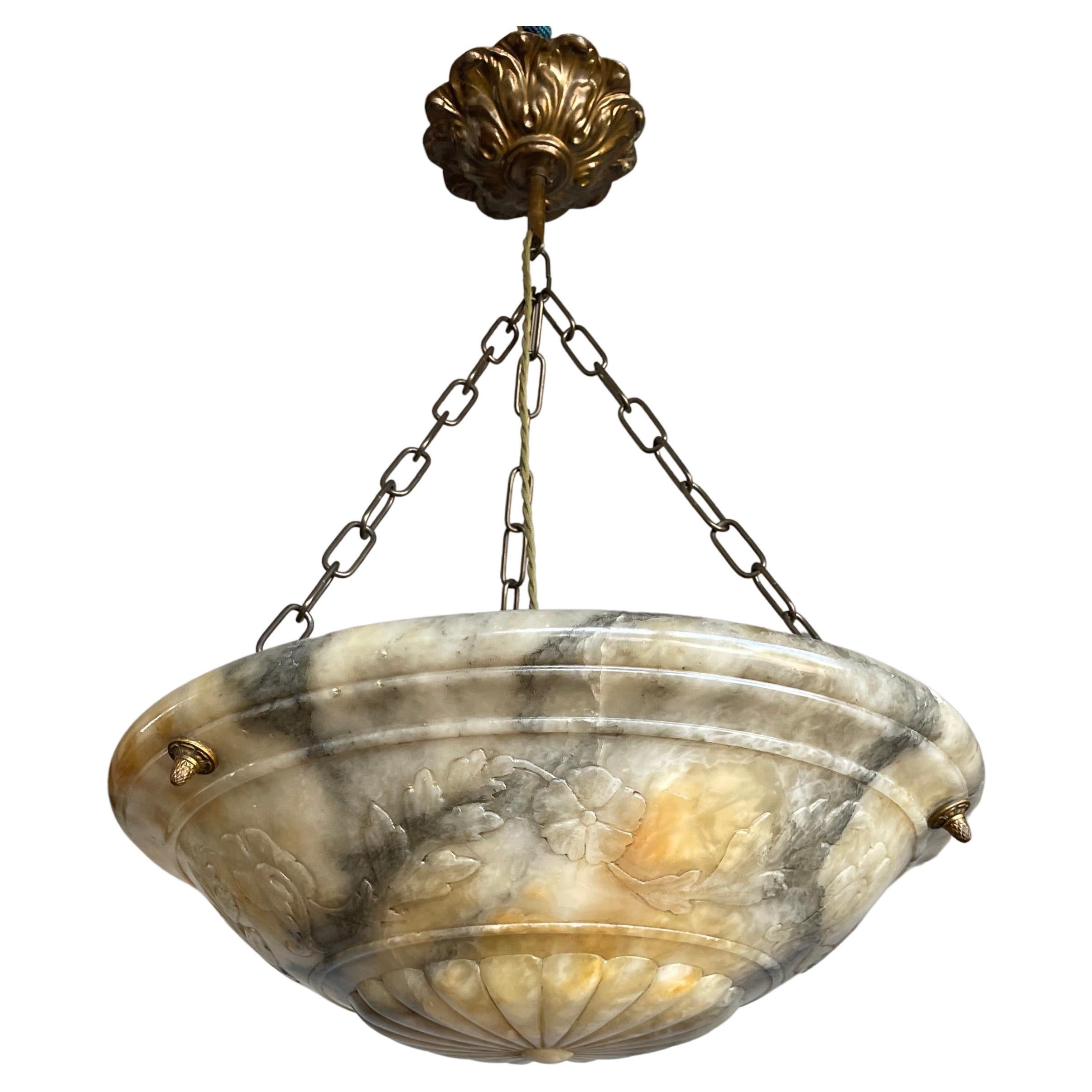 Large antique ceiling fixture / chandelier with stunning flowers & leafs hand carved in a beautiful alabaster stone dish shade of 19.7 inches in diameter.

Thanks to its unique design, its large size and its truly excellent condition this alabaster