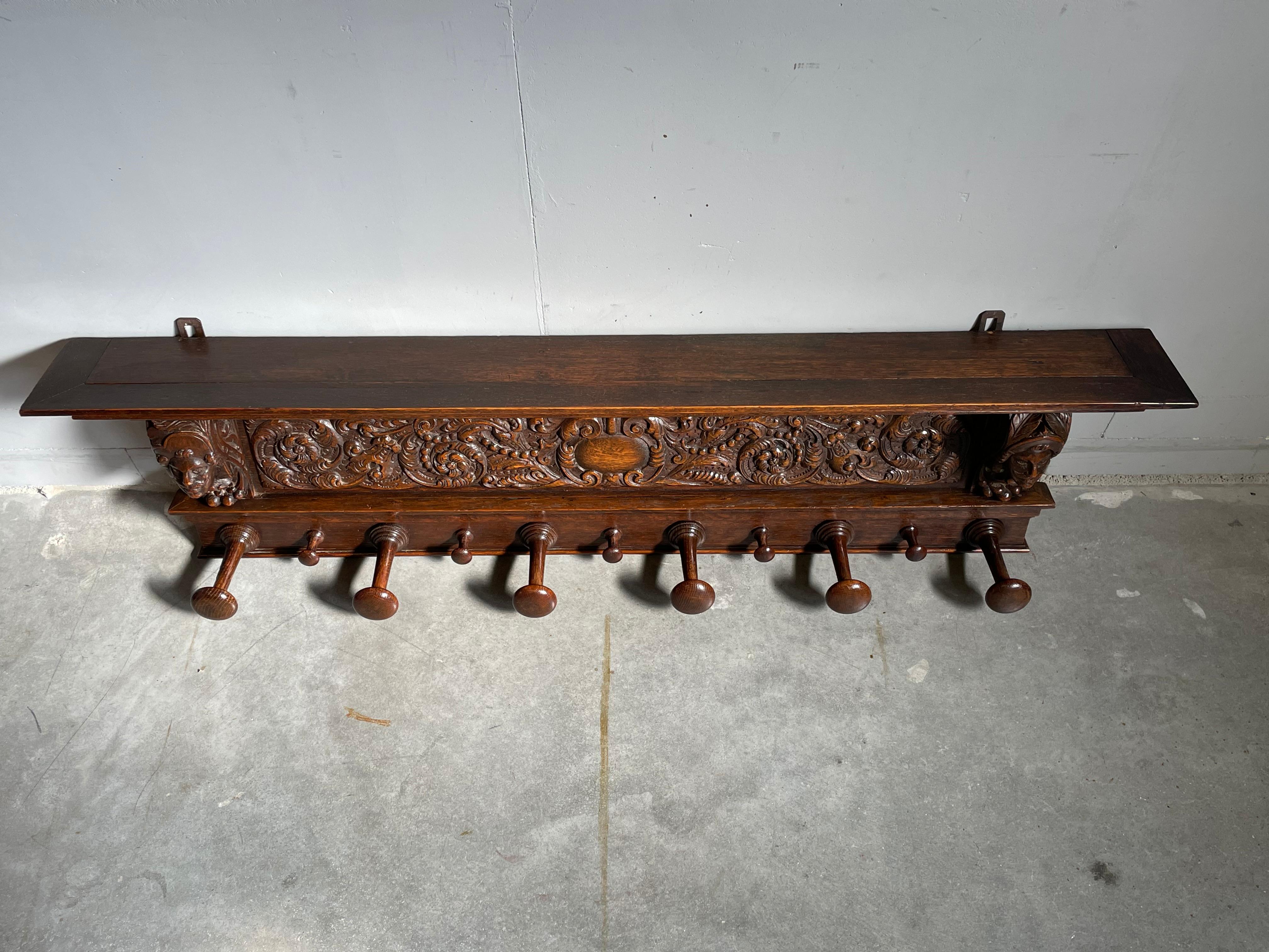 Hand-Crafted Large Antique and Quality Carved Wooden Wall Coat Rack with Noble Men Sculptures For Sale