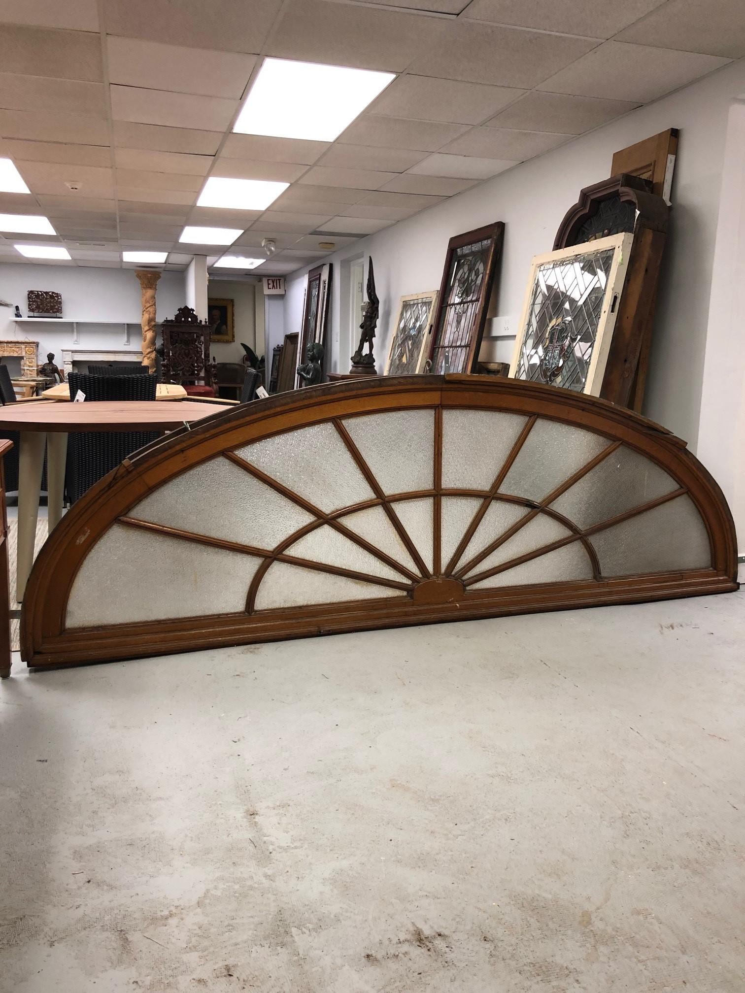 Large antique Palladian Transom Window in a oak frame with frosted glass panels. This multi panel window in a oak frame was salvaged from a New Haven Ct estate. It is a spectacular window in its oak frame with multi panel textured glass panels and a