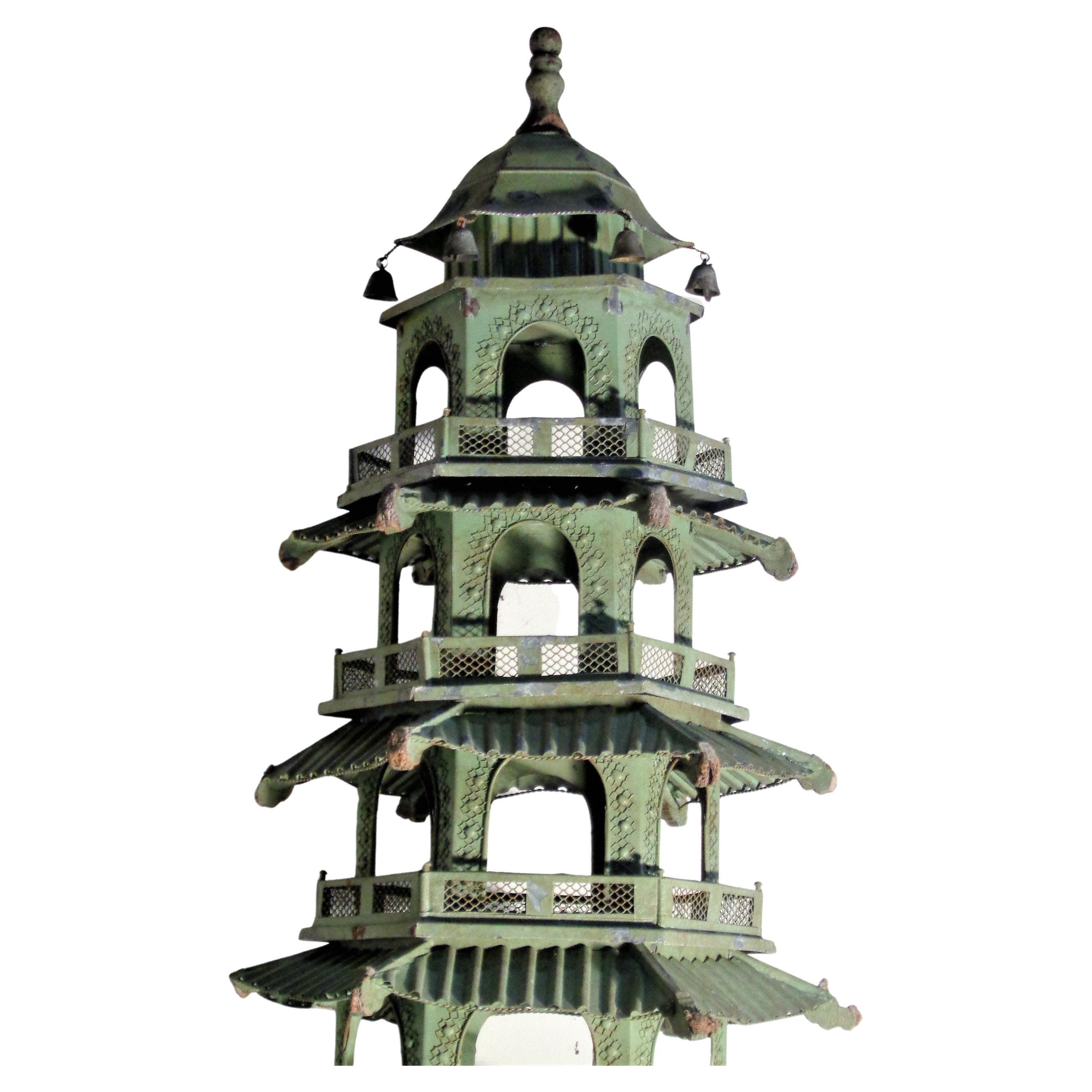 Large galvanized tin and wood architectural model of a beautifully detailed seven hexagonal storied Chinese buddhist pagoda in original old dry pale sage green painted surface. Measures 64