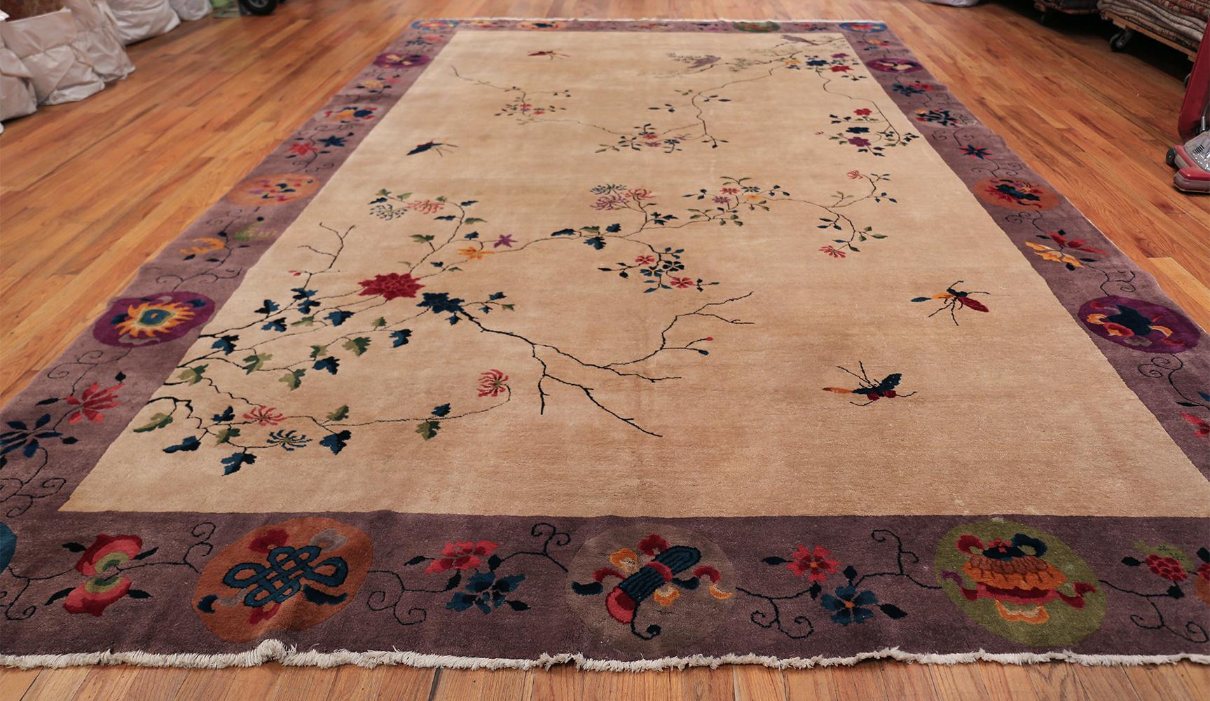A beautiful and extremely artistic large antique Art Deco Chinese rug, country of origin / rug type: China, date circa 1920. Size: 10 ft 2 in x 15 ft 3 in (3.1 m x 4.65 m)

This stunning Art Deco rug features a beautiful garden and all of the