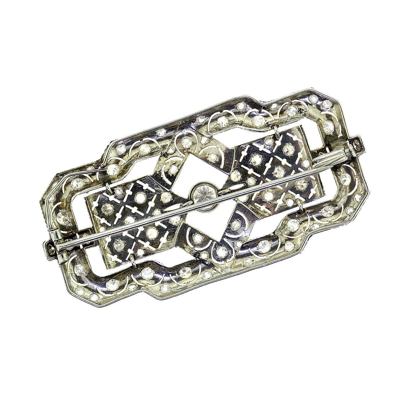 Stunning Art Deco Diamond studded pendant/brooch/pin handcrafted to Perfection. Set in platinum, this item promises a Lasting Shine. Make a standout addition to your collection.

Contact us for more information.

- Style: Brooch / Pin / Pendant
-