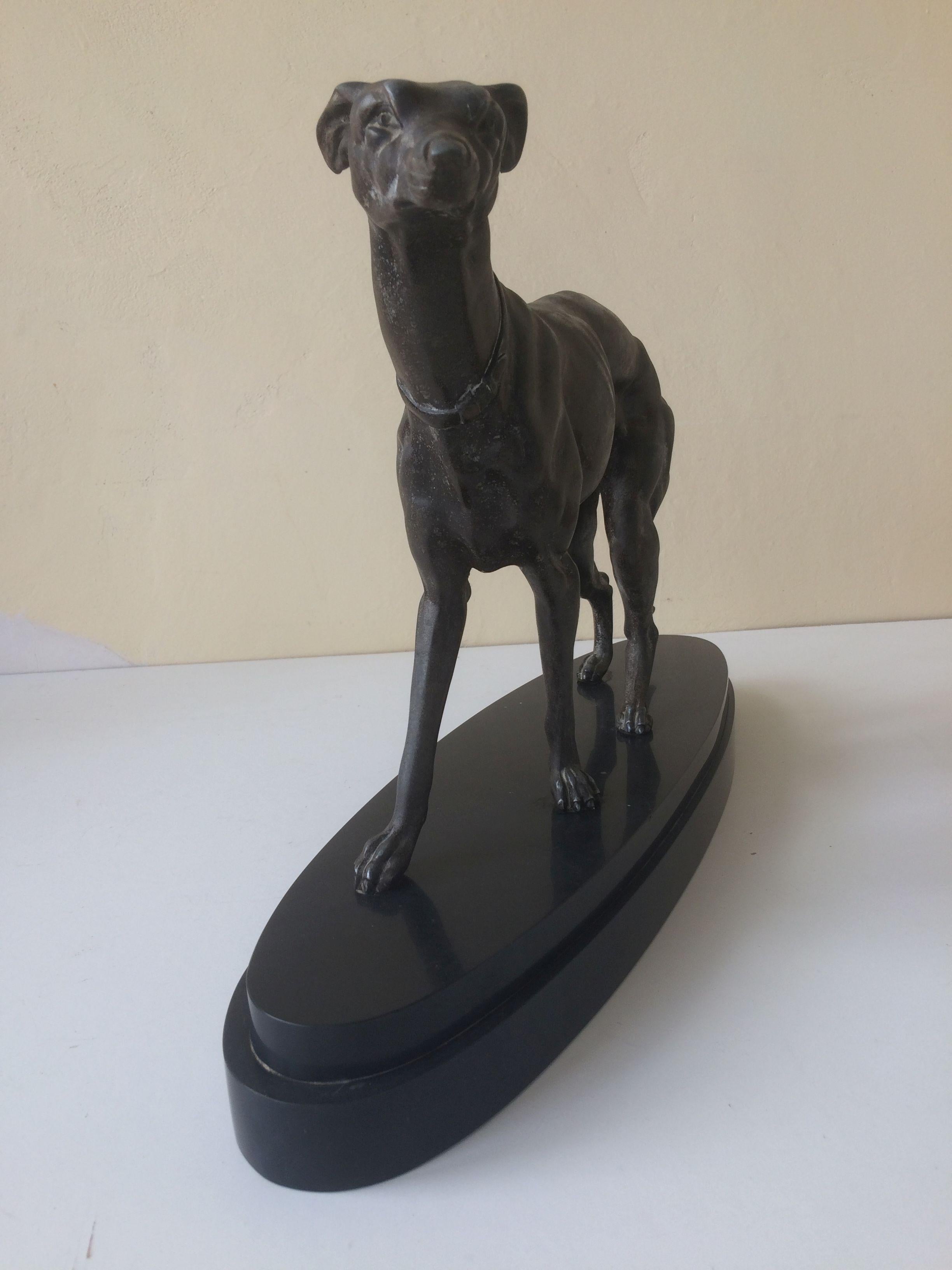 Statue of a Greyhound dog on a marble base.
The image is very nicely styled with original patin.
Material: zamak alloy and marble.
Origin: France
Period: Art Deco
Weight 13 kg.

Width of base: 56 cm.
Depth base: 16 cm.
Base height: 5