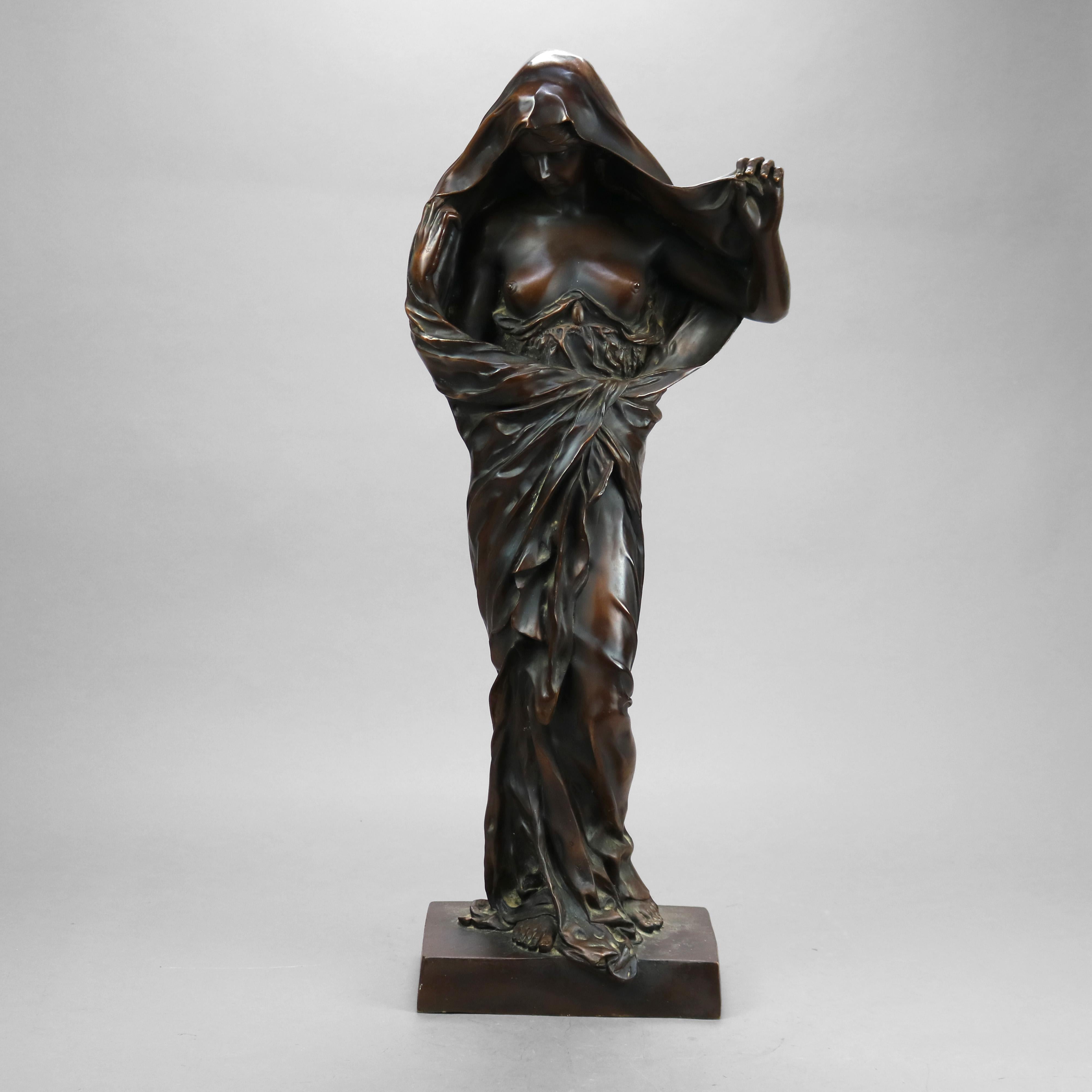 An antique and large Art Nouveau figural statue offers cast full figure partially nude Neoclassical female on plinth, artist signed illegible as photographed, 19th century

Measures - 30.5'' H x 9.75'' W x 6.5'' D.