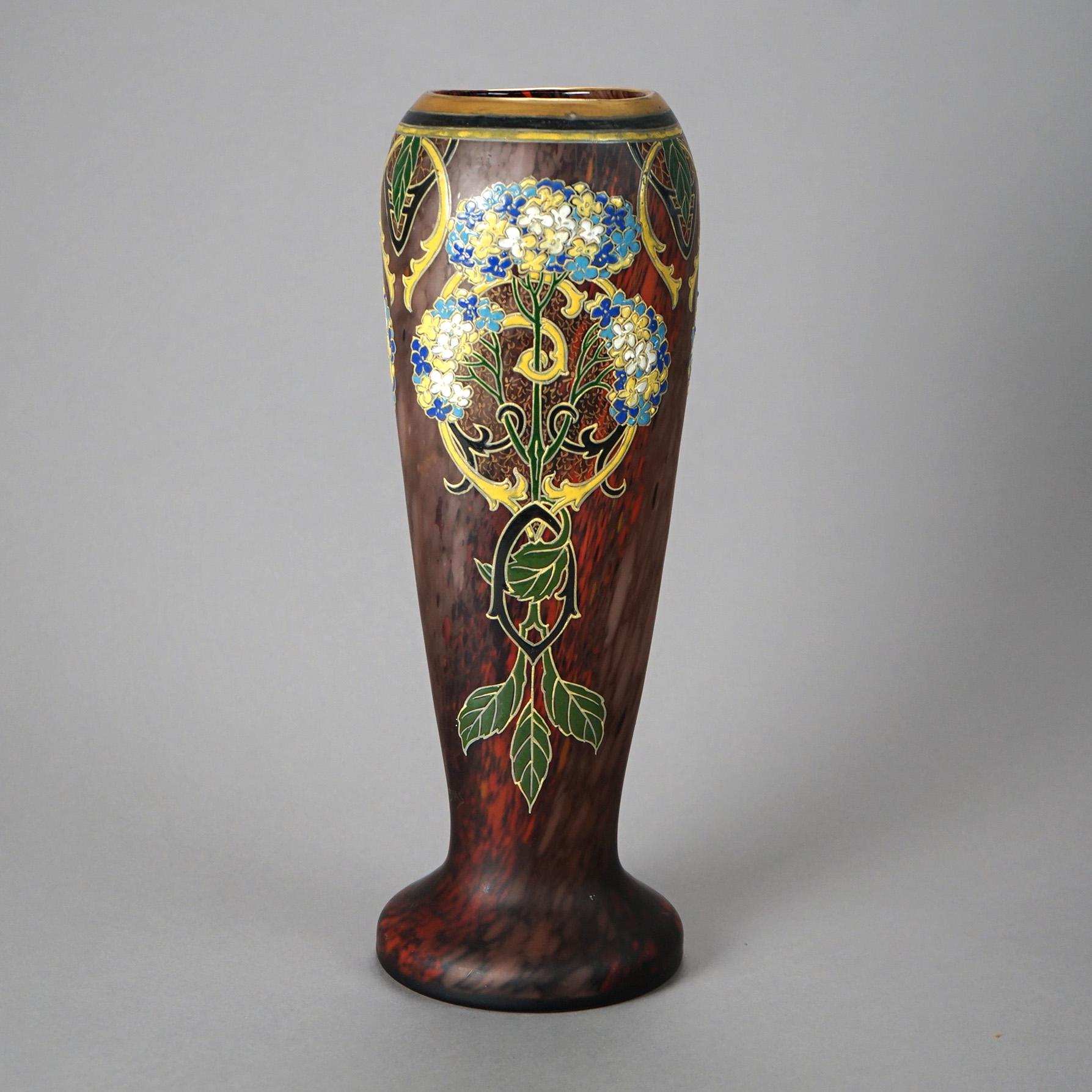 An antique large Art Nouveau vase by François Theodore Legras of France offers hand blown art glass construction with hand enameled stylized trellises, scrollwork and hydrangea flowers, c1890

Measures - 15.5
