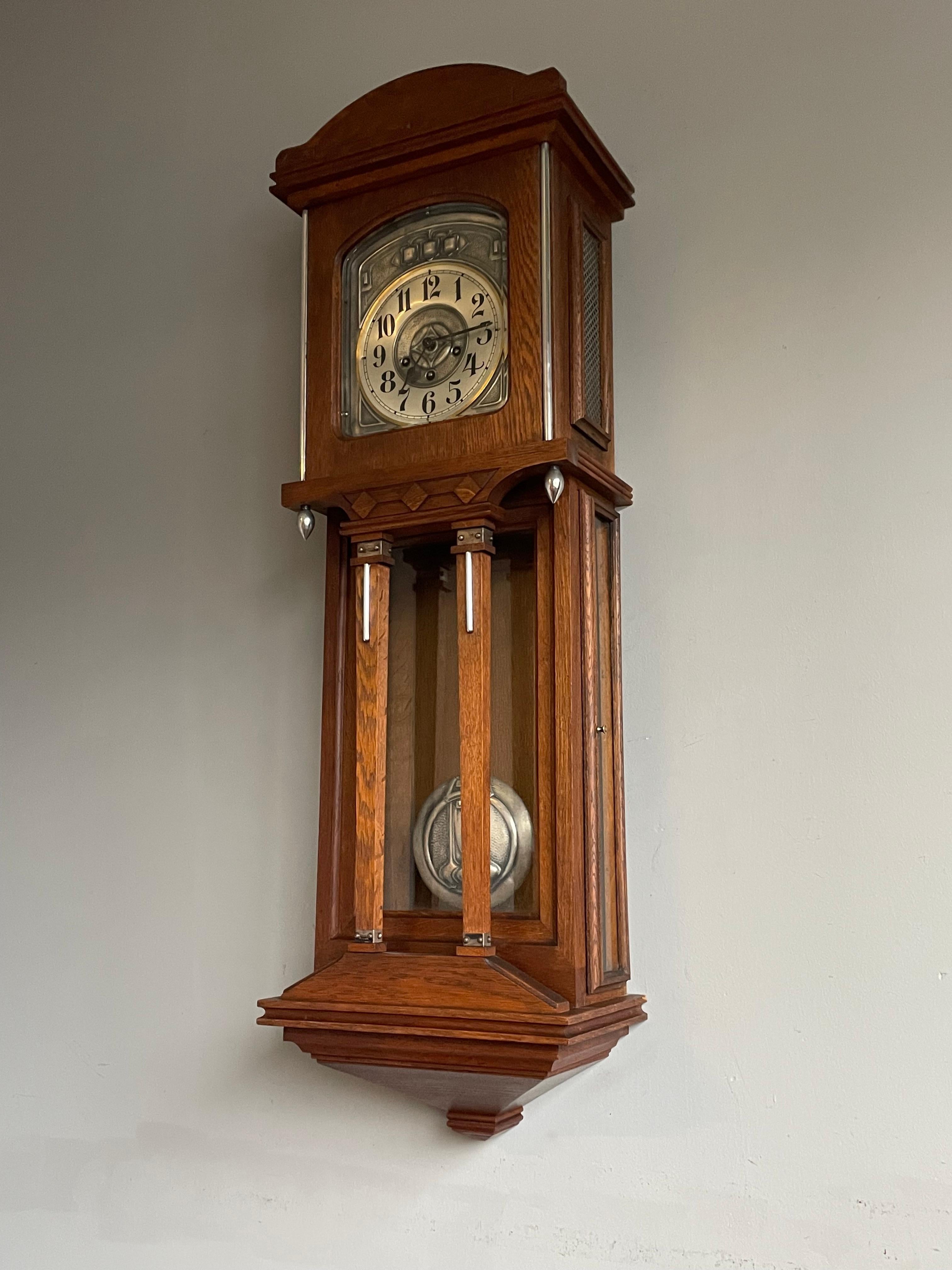 Stunning and largest early 1900s Arts and Crafts wall clock.

If you are looking for a larger than average, striking design and excellent condition Arts and Crafts wall clock then this rare specimen could be gracing the wall of your home or office