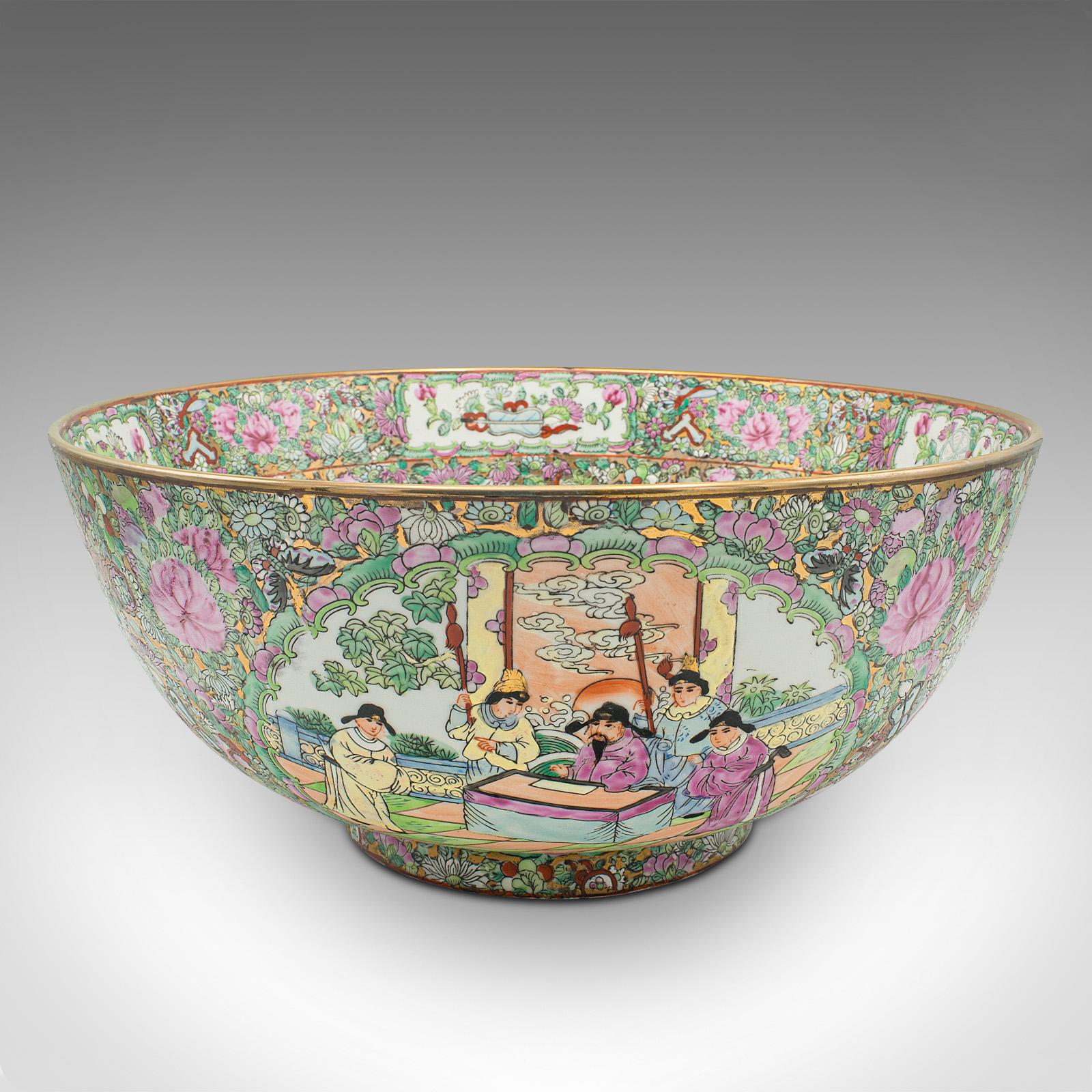 This is a large antique banquet bowl. A Chinese, ceramic serving dish, dating to the late Victorian period, circa 1900.

Imposing bowl, with exceptional decorative appeal.
Displays a desirable aged patina and in good original order.
Abundance of