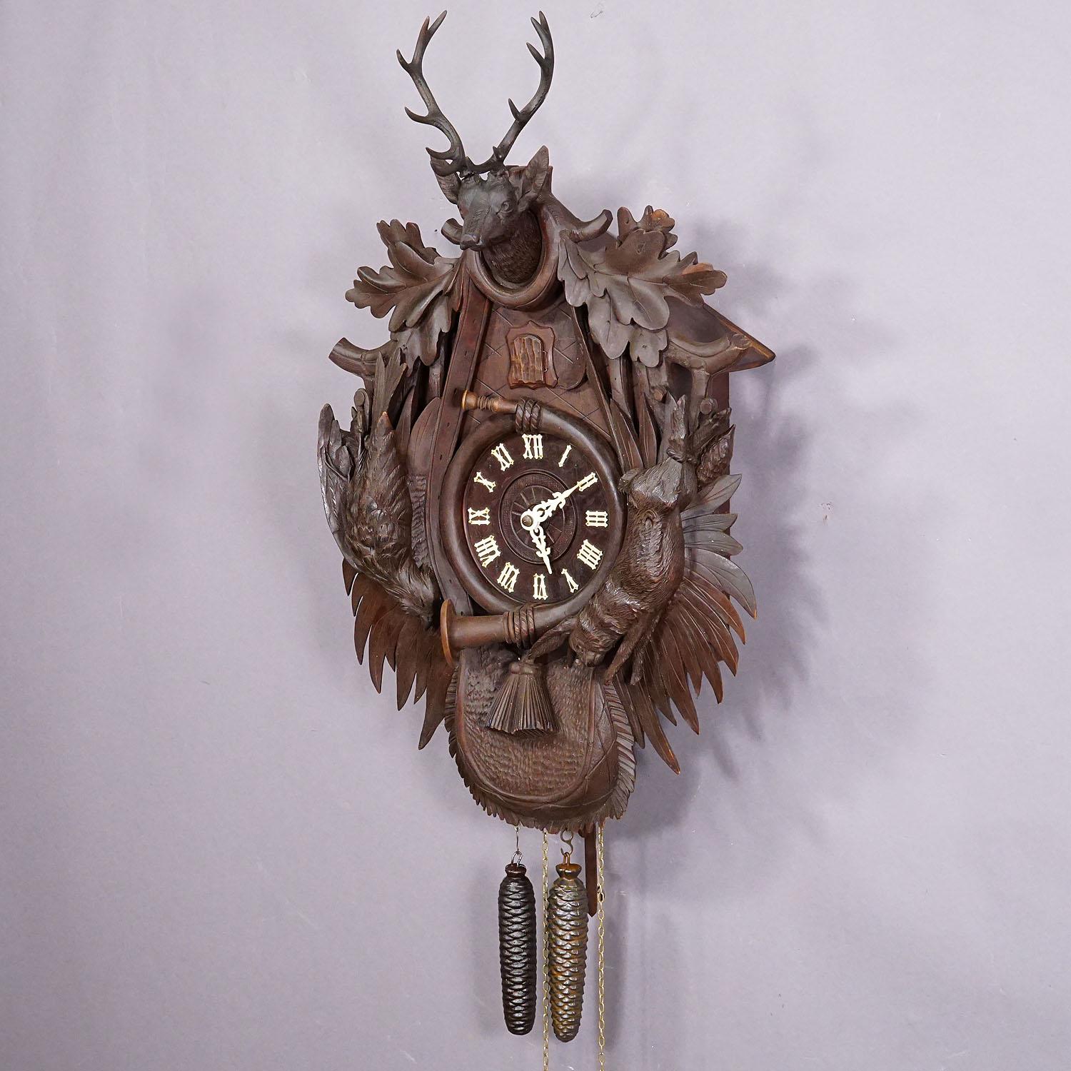 German Large Antique Black Forest Carved Cuckoo Clock with Stag Head For Sale