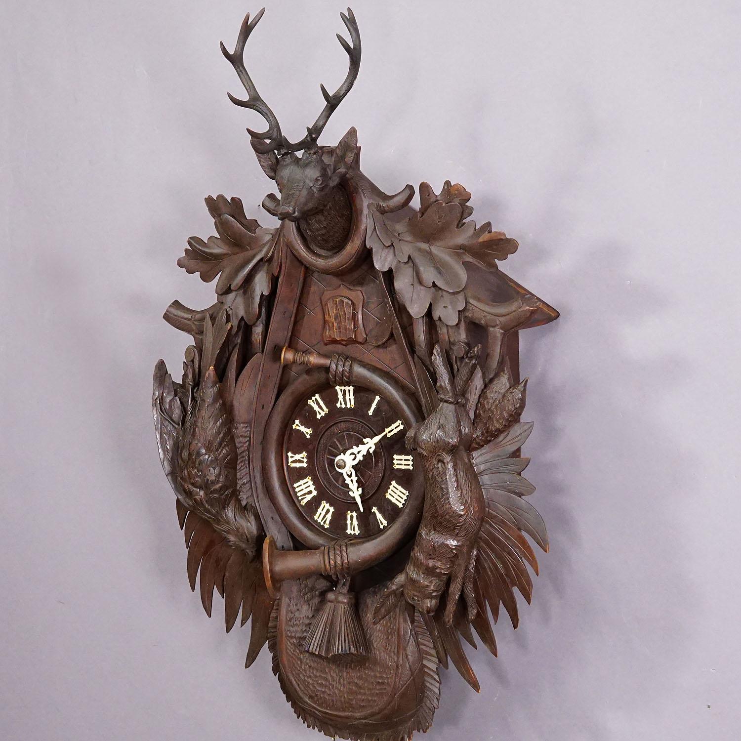 Wood Large Antique Black Forest Carved Cuckoo Clock with Stag Head For Sale