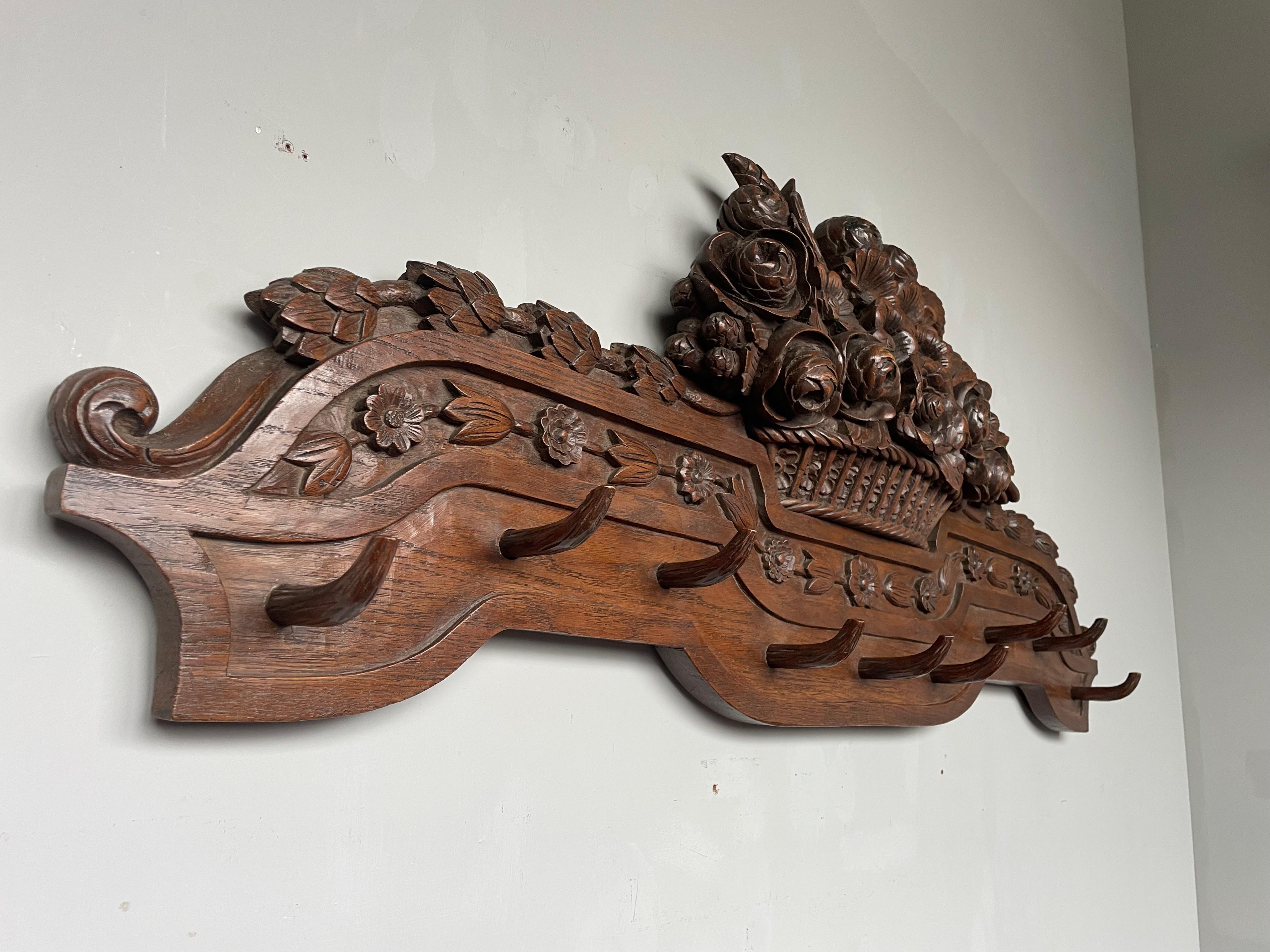 Rare, late 1800s, solid oak, handcarved, Black Forest wall coat rack.

Only very rarely will you come across an antique that is as good and original as this large size, work of art coat rack. All handcrafted in the late 1800s, a coat rack of this