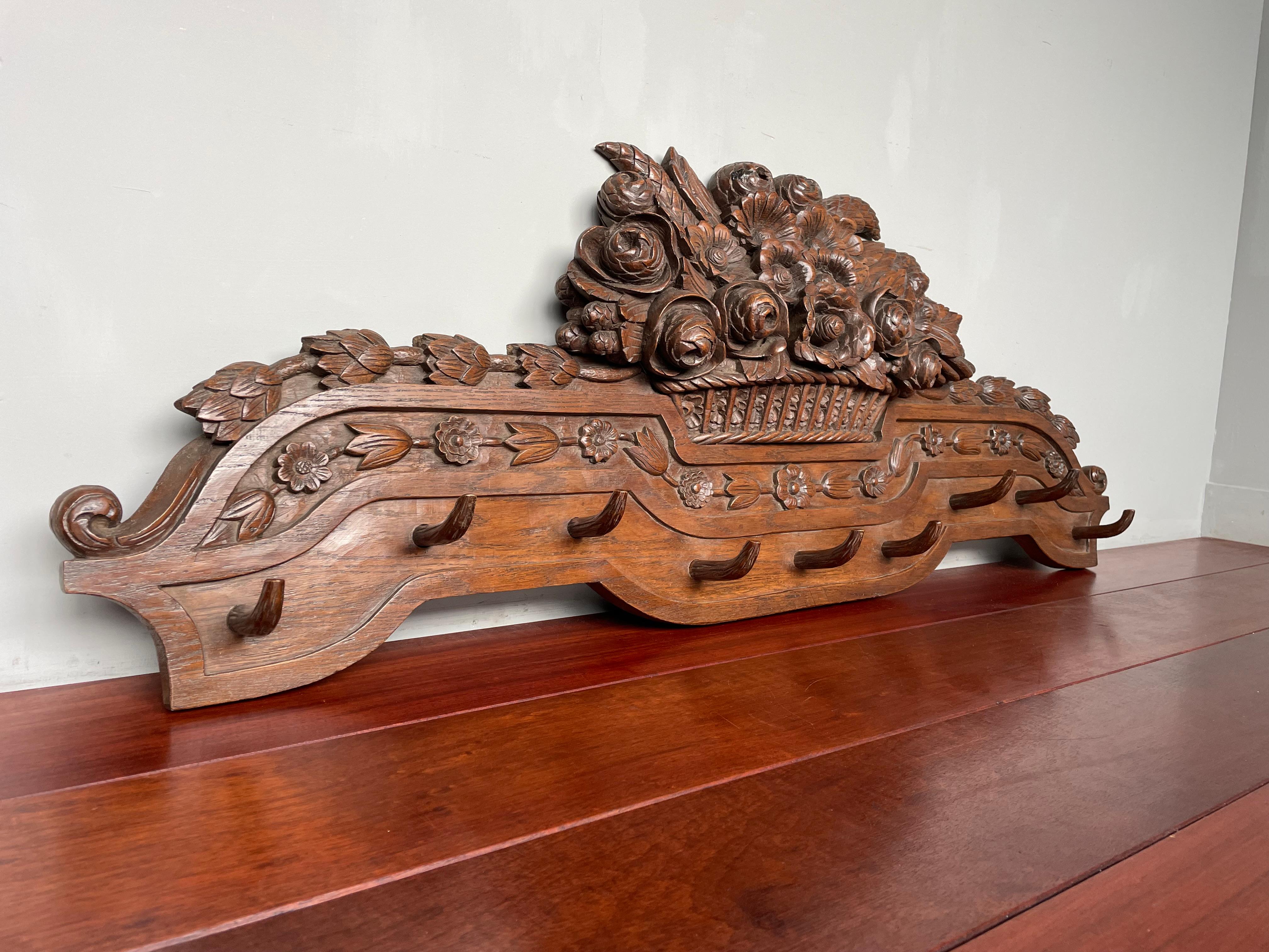 Hand-Carved Large Antique Black Forest Wall Coat Rack w. Hand Carved Basket of Flowers 1890s For Sale