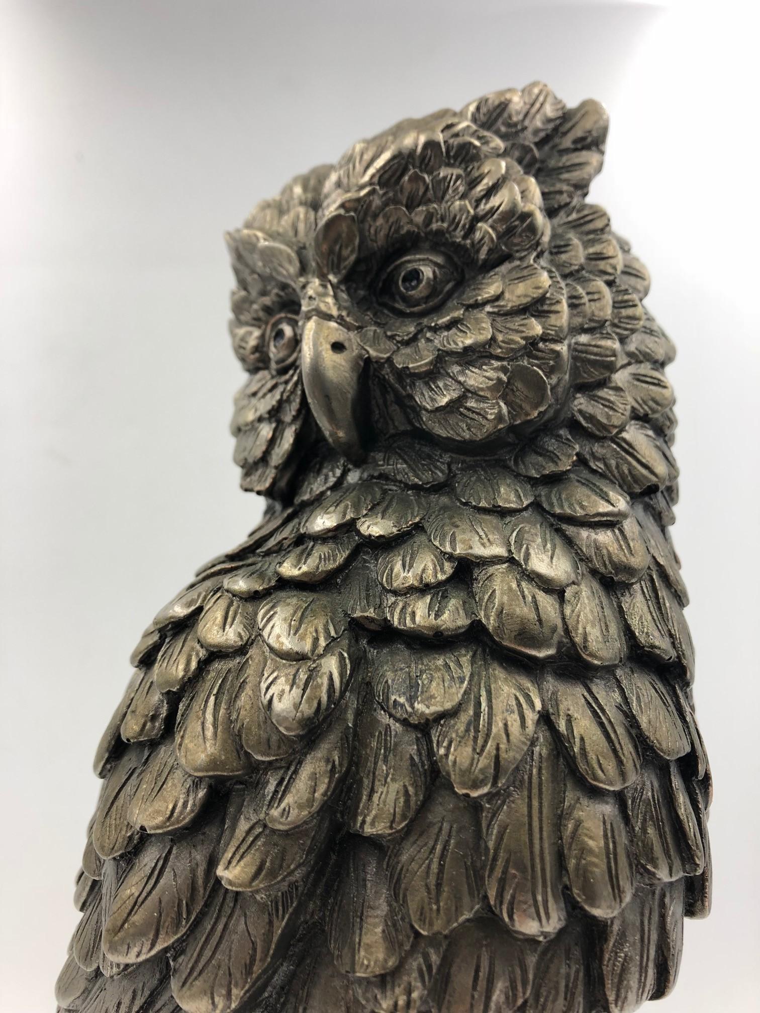 Finest example of a figural owl sculpture, made of brass and silvered, impressive one stands 33 cm tall and features a beautifully cast owl sitting on a branch.

The making of appears to be in Germany, maybe by the company WMF, which made some of