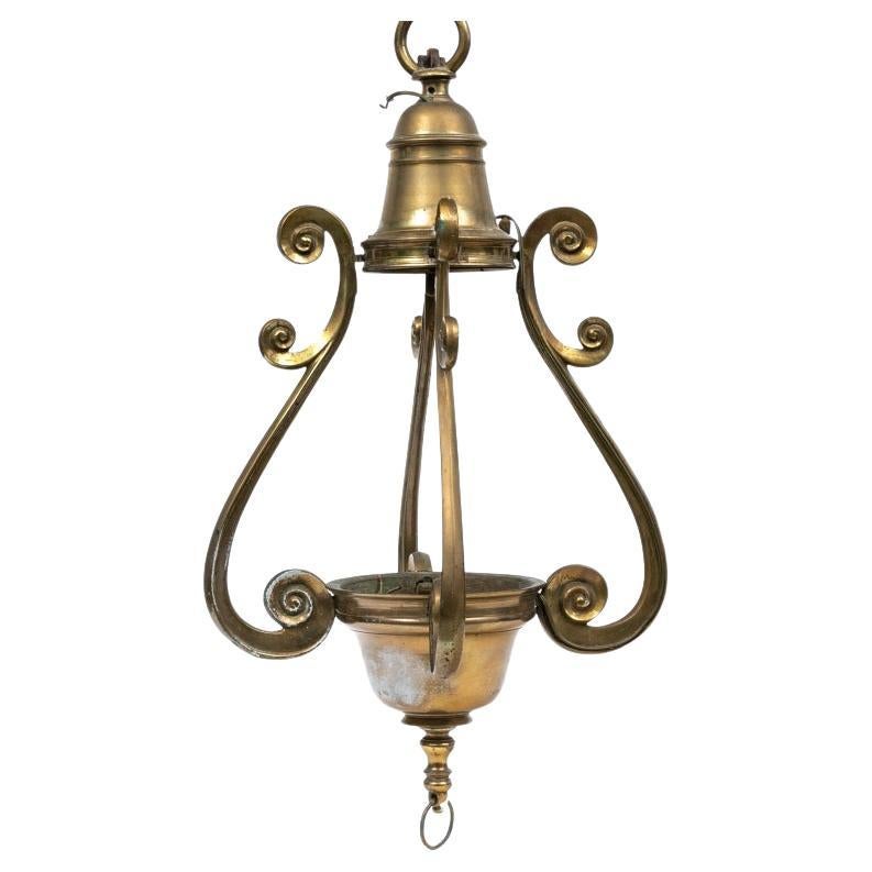 Grand luminaire en bronze antique provenant d
un paquebot de luxe français à restaurer en vente