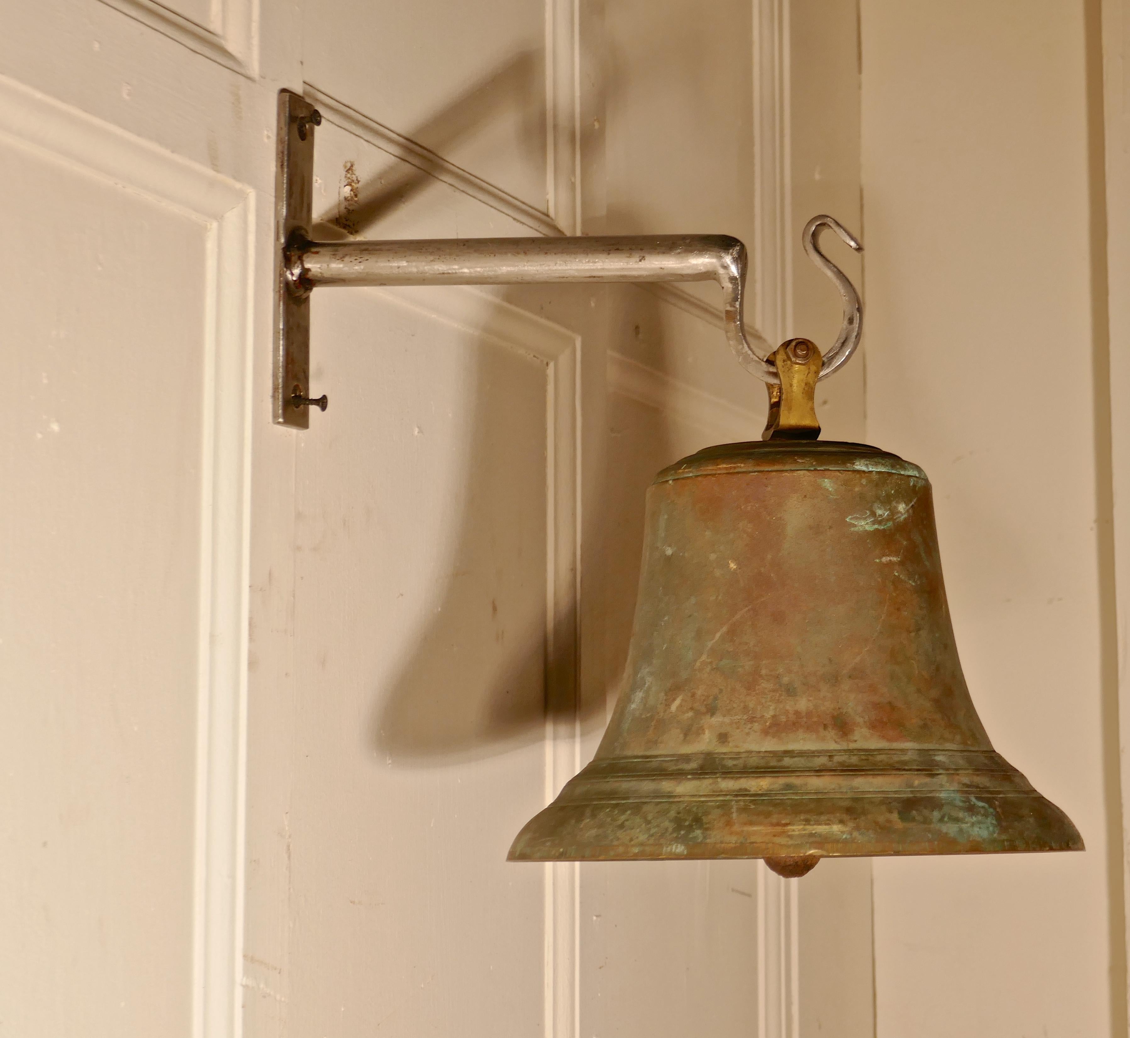 Large antique bronze French ships bell with new wall mounting bracket. 

19th century bronze ships bell comes with a steel blacksmith made wall bracket
The bell is complete with clapper, it is in very good original un polished condition, it is