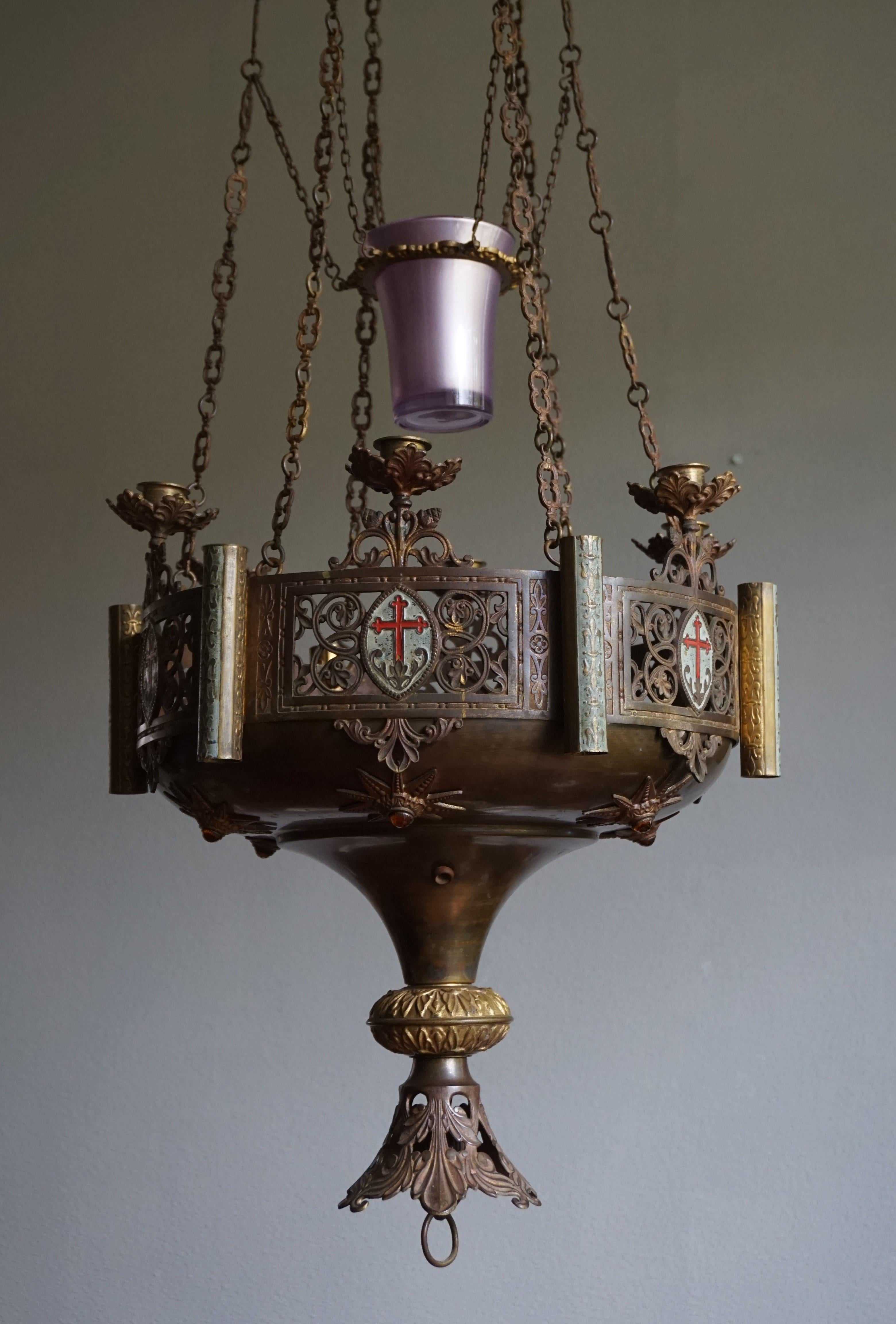Impressive, seven light Gothic chandelier from the 1800s.

This rare and beautiful looking church chandelier is another one of our recent great finds. The design with all the amazing, handcrafted bronze details and the ancient patina makes this