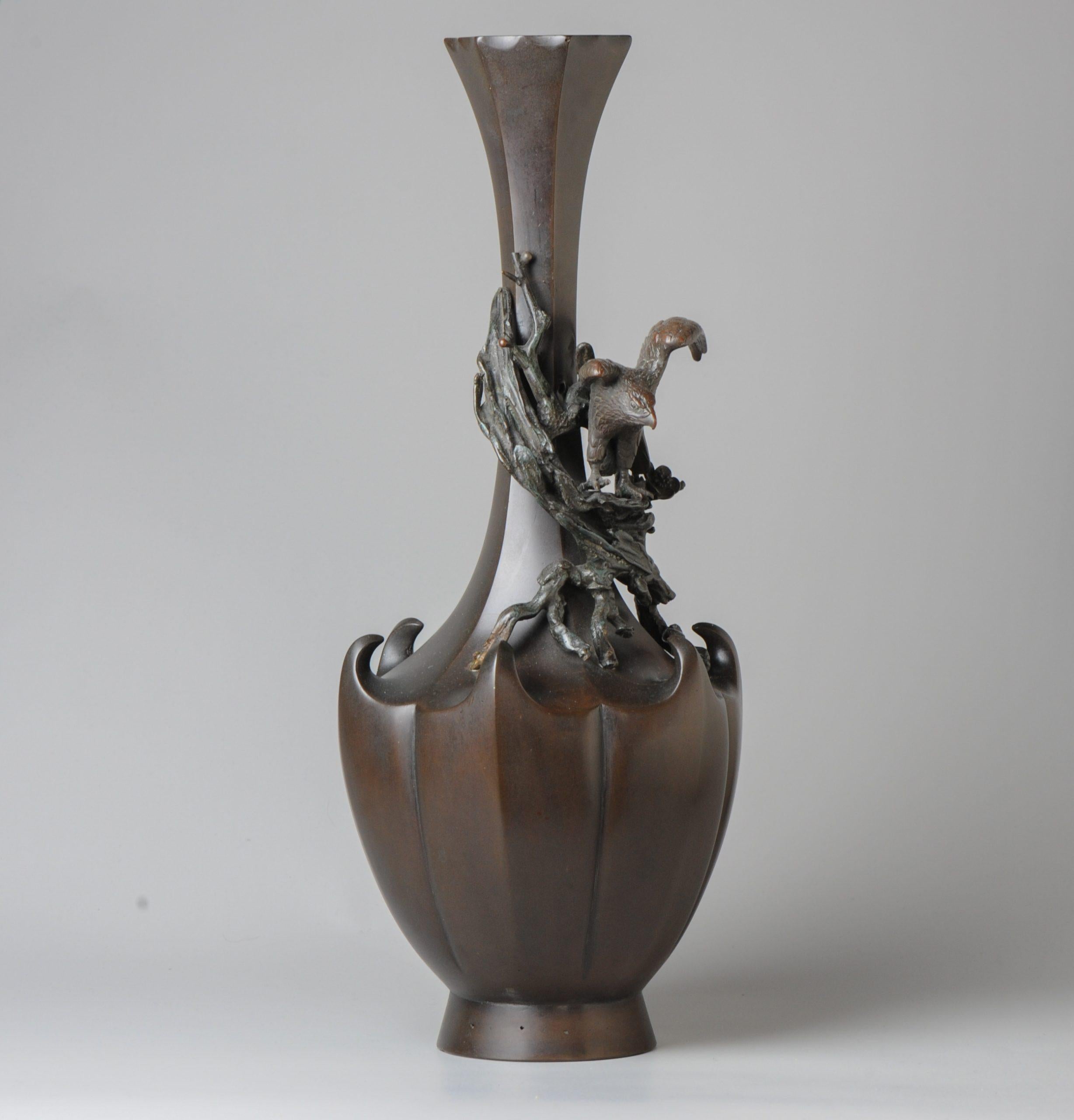 Description
Nicely made artifact of very high quality.

The vase is shaped nicely and the addition of a bird of prey, Eagle, on a branch is amazing.
The mark reads:
?? Seiya.
This is ??? ?? Genryusai Seiya of the Meiji