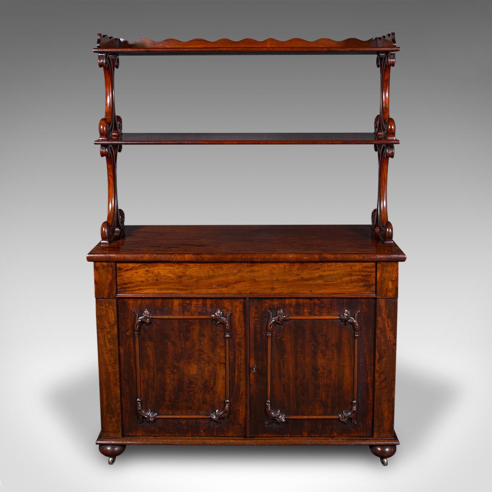 
This is a large antique buffet server. An English, mahogany side cabinet with display tiers, dating to the early Victorian period, circa 1840.

Striking buffet, with beautiful colour and open display shelves
Displaying a desirable aged patina and