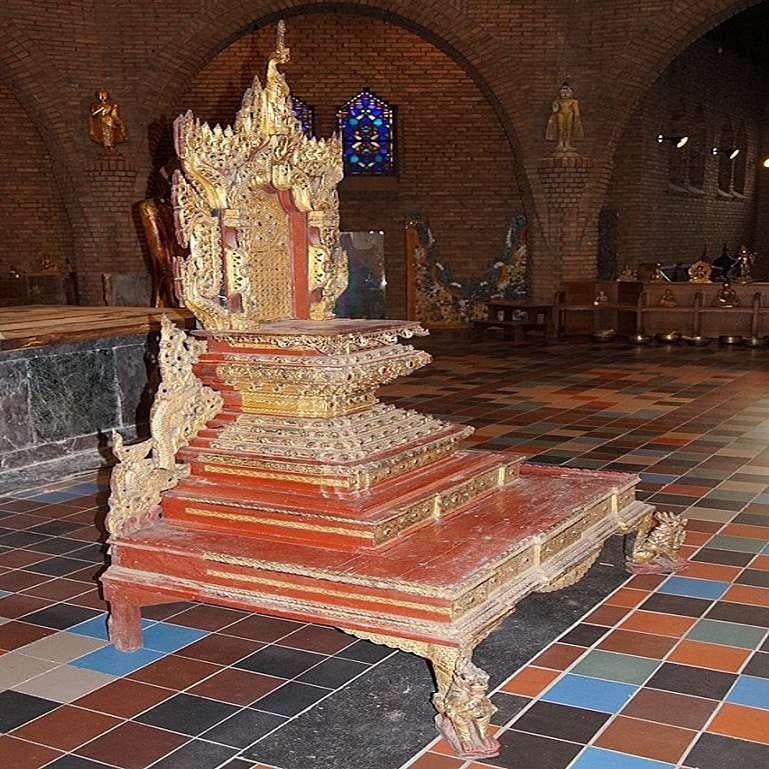 Material: wood
210 cm high 
136 cm wide and 98 cm deep
Gilded with 24 krt. gold
Mandalay style
Originating from Burma
19th century
10 different parts - can be shipped worldwide !
A very rare and special throne !
In the last picture, the