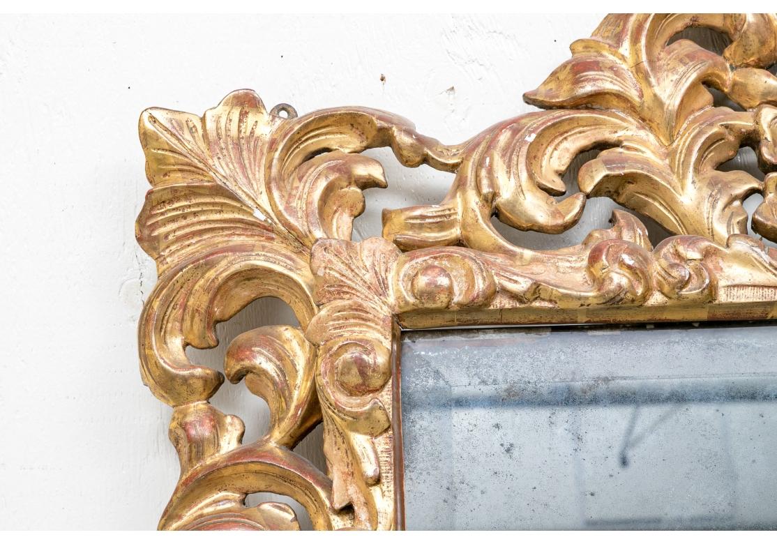 19th Century Large Antique Carved, Gessoed And Heavily Gilt Baroque Mirror For Sale