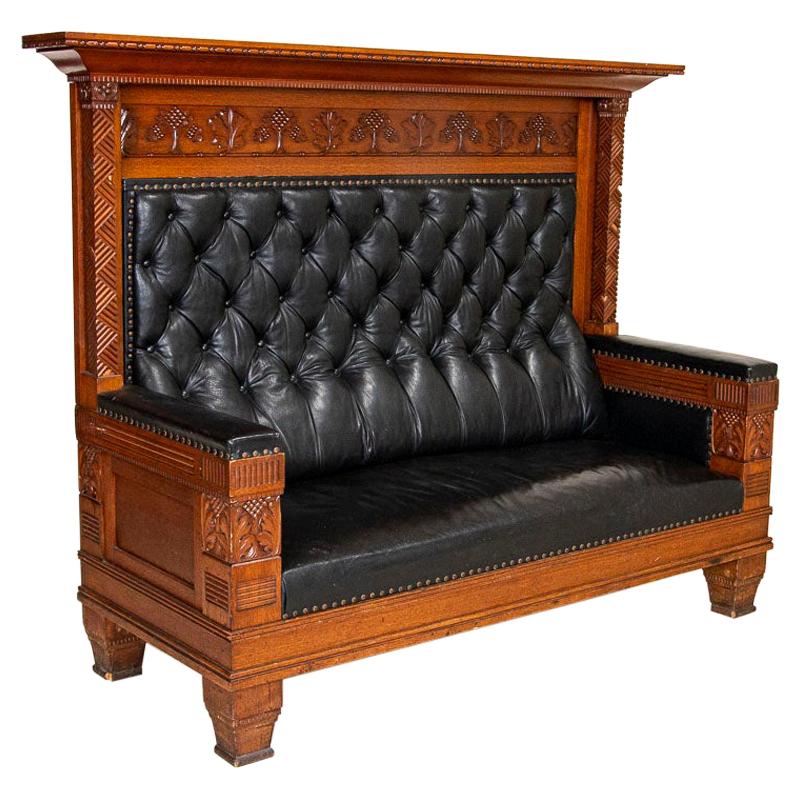 Large Antique Carved Oak High Back Bench with Black Leather Upholstery