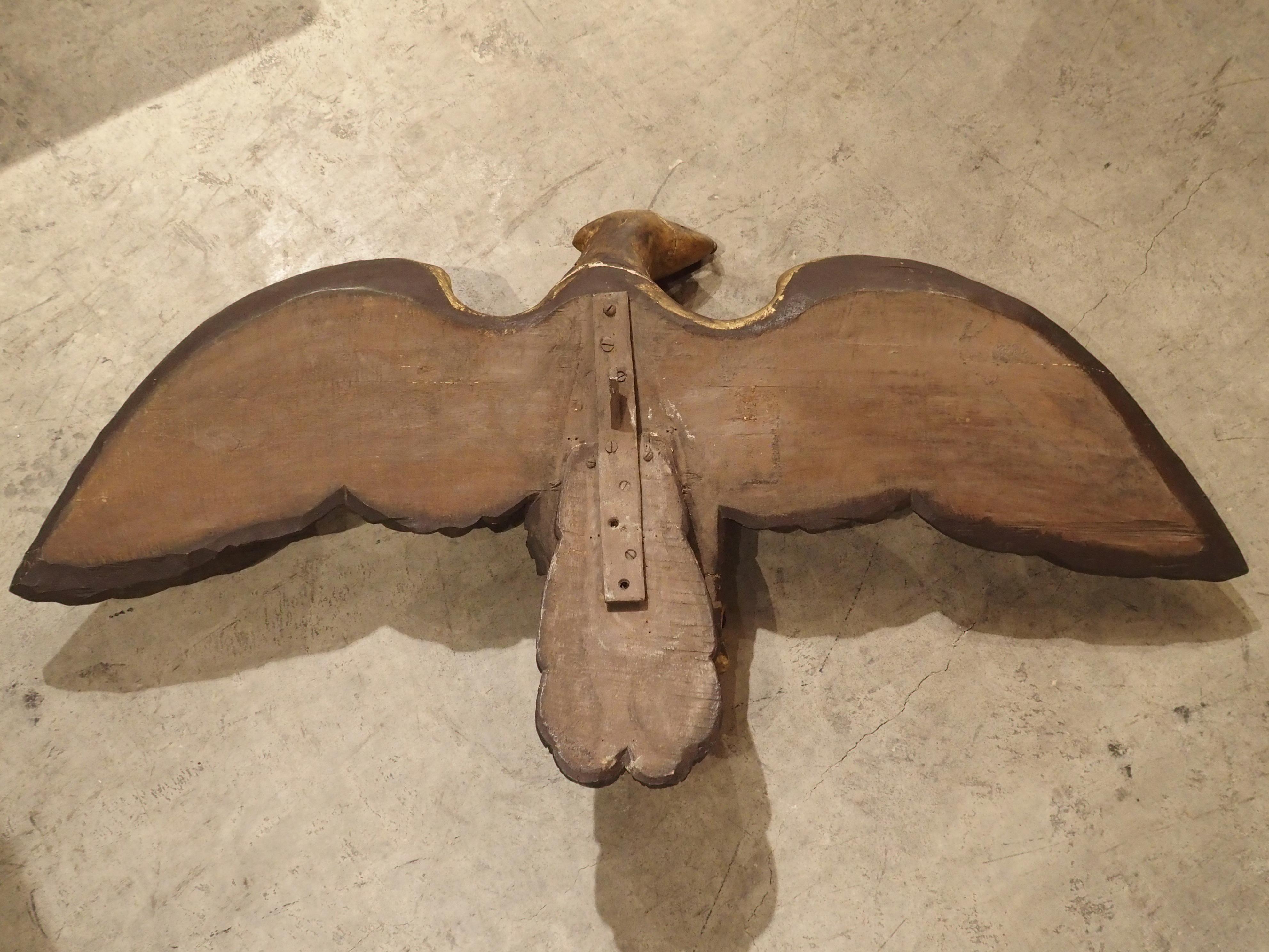 large wooden eagle sculpture