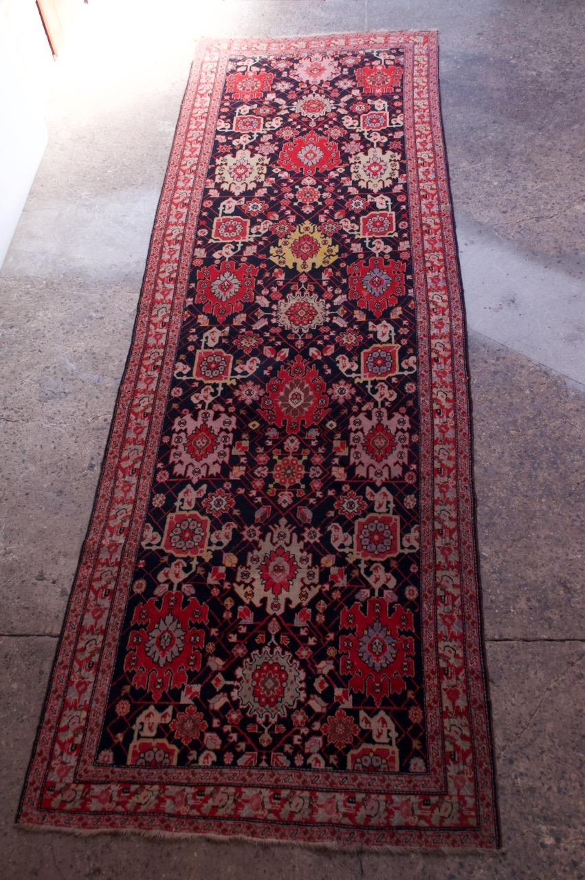 Caucasian rug from the Karabagh (Karabakh) region of the southern portion of the Caucasus mountains in present day eastern Armenia and southwestern Azerbaijan, circa 1920. Impressive size: 198.25