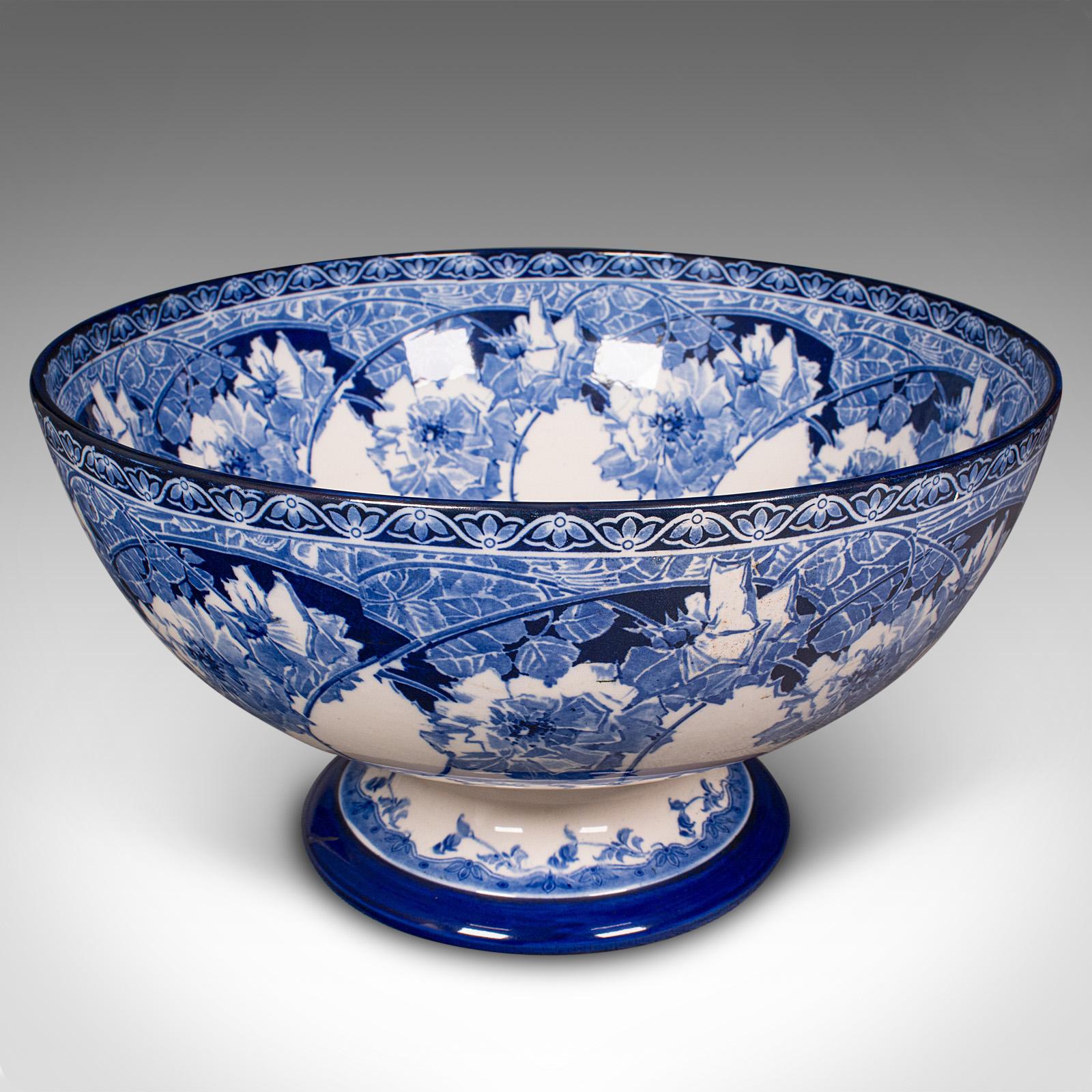 This is a large antique celebration fruit bowl. An English, ceramic footed serving dish, dating to the early 20th century, circa 1920.

Fascinatingly generous proportion with attractive blue decor
Displays a desirable aged patina and in good order