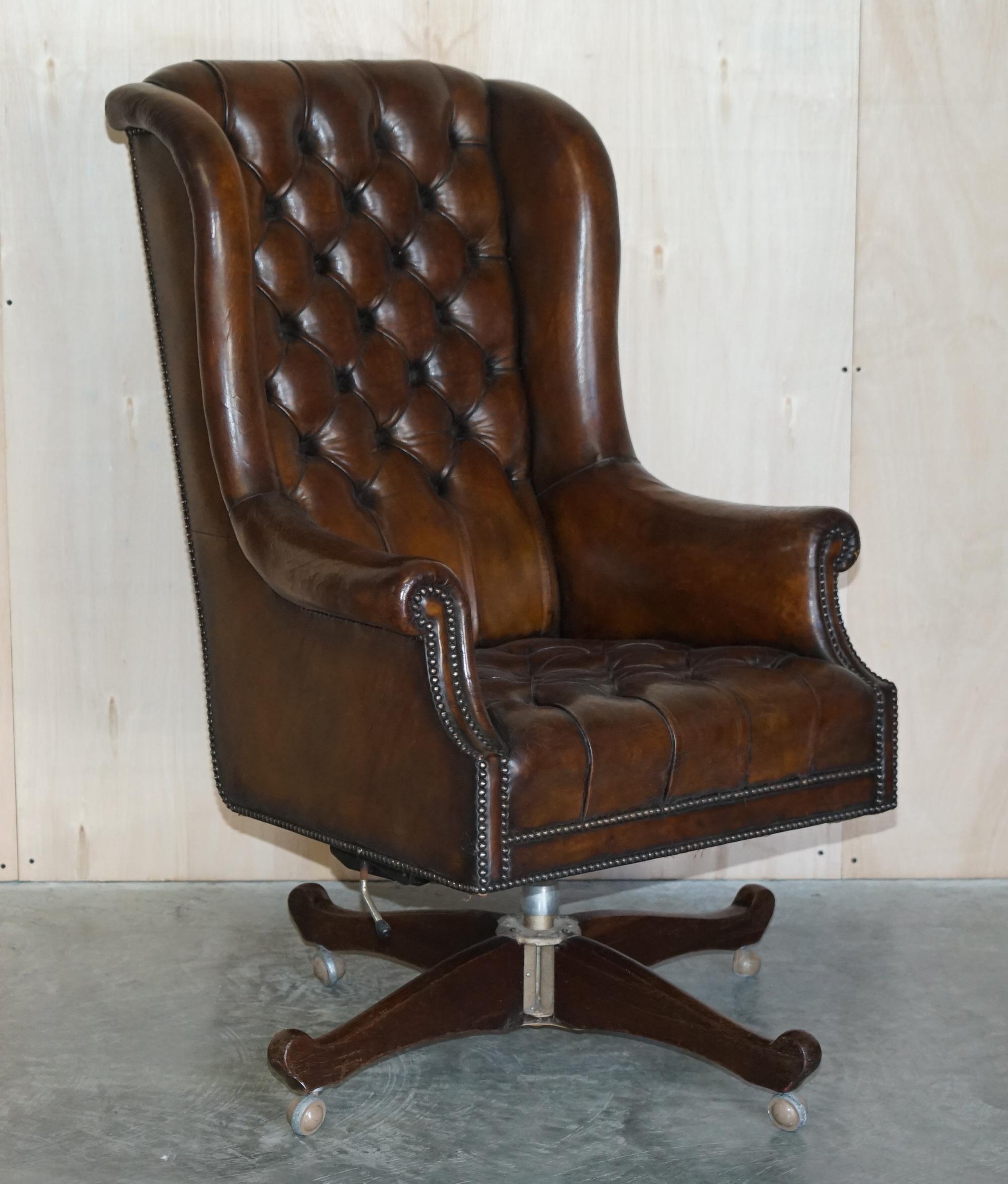 We are delighted to offer for sale this stunning fully restored circa 1900 hand dyed deep cigar leather very large Chesterfield Wingback office chair with original leather and patina 

This is a very comfortable captain’s indeed, it’s like your