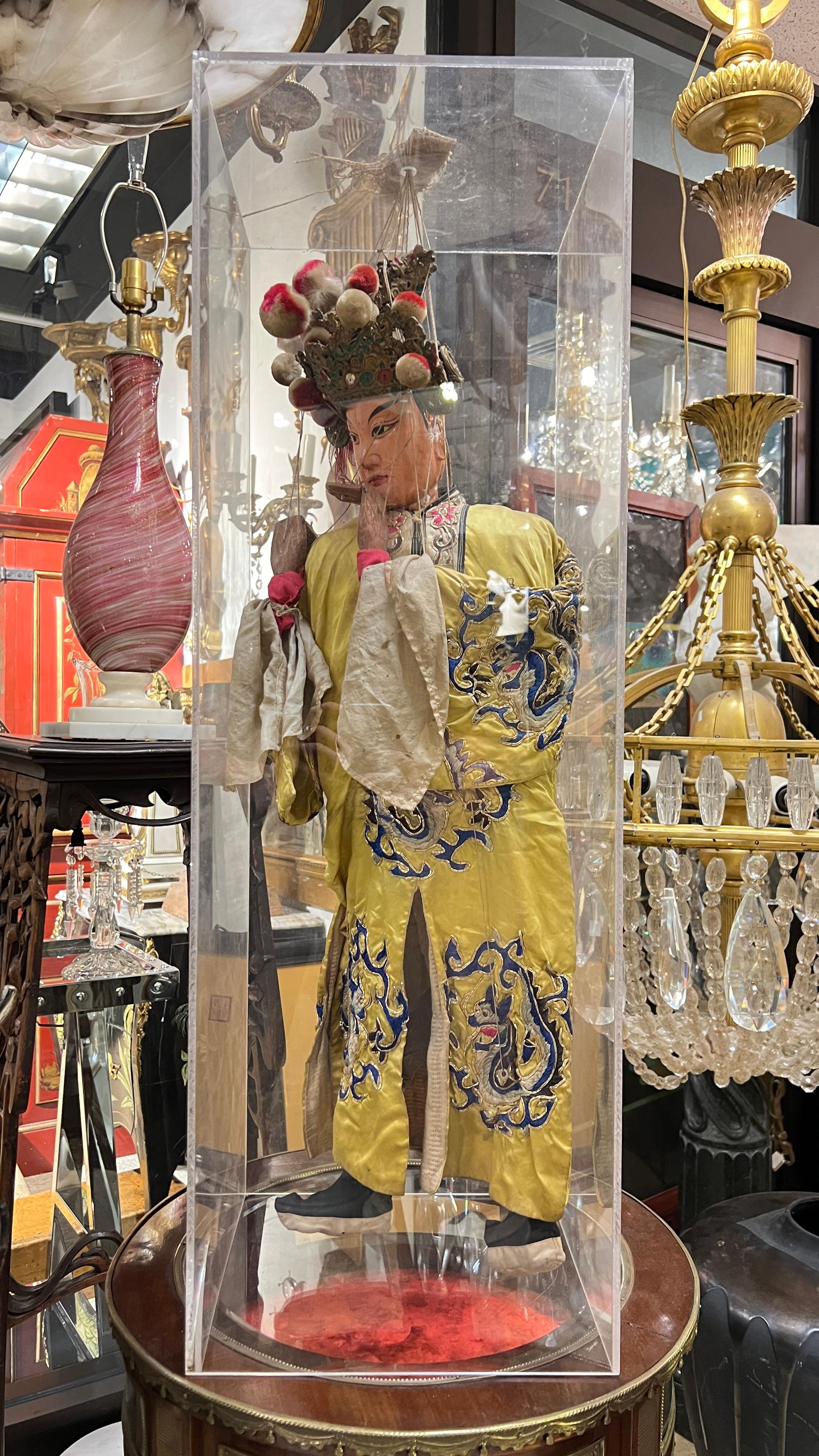 Antique funerary ceremony male marionette string puppet depicted as an emperor, with hands and head in softwood and a silk robe embroidered with dragons with gilt thread. Hands are jointed at the first knuckle and crown is crafted from various