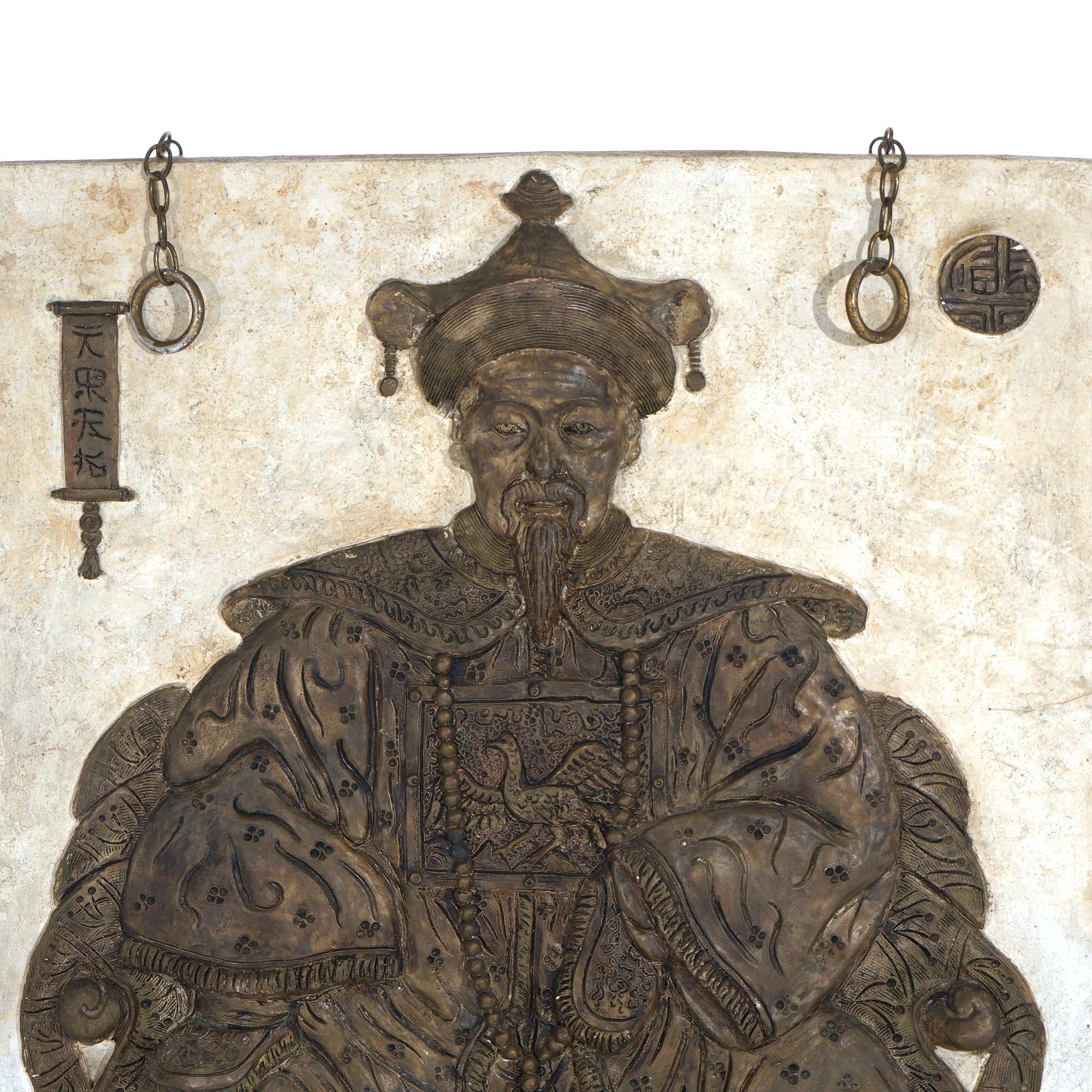 An oversized antique Chinese deity plaque offers plaster plaque with seated deity figure in high relief, c1920

Measures - 57