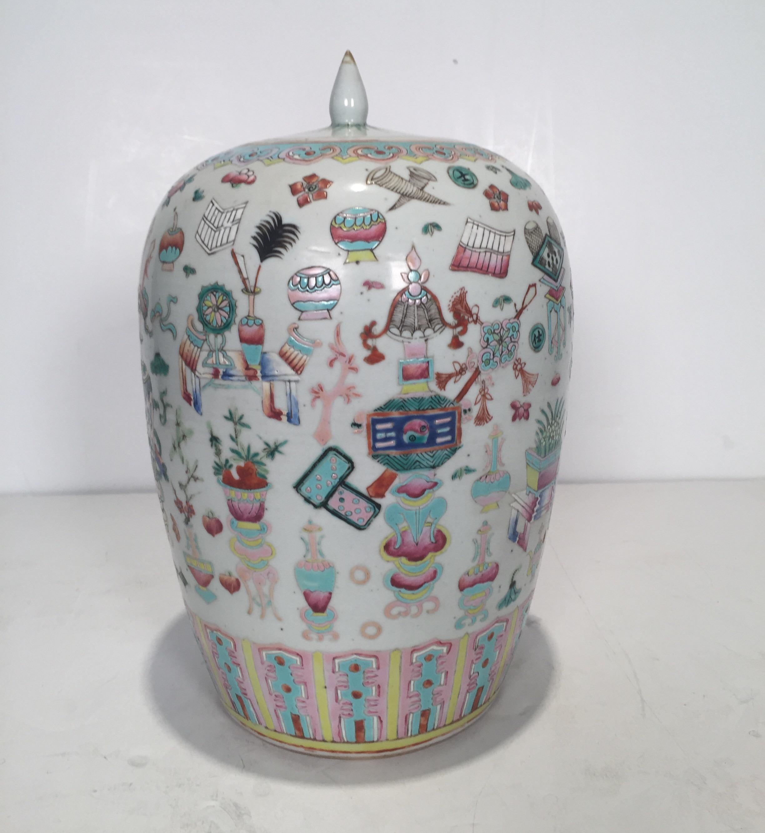 A 19th century hand painted porcelain ginger jar with lid. The white porcelain background with all over decoration in the 1000 treasures pattern.