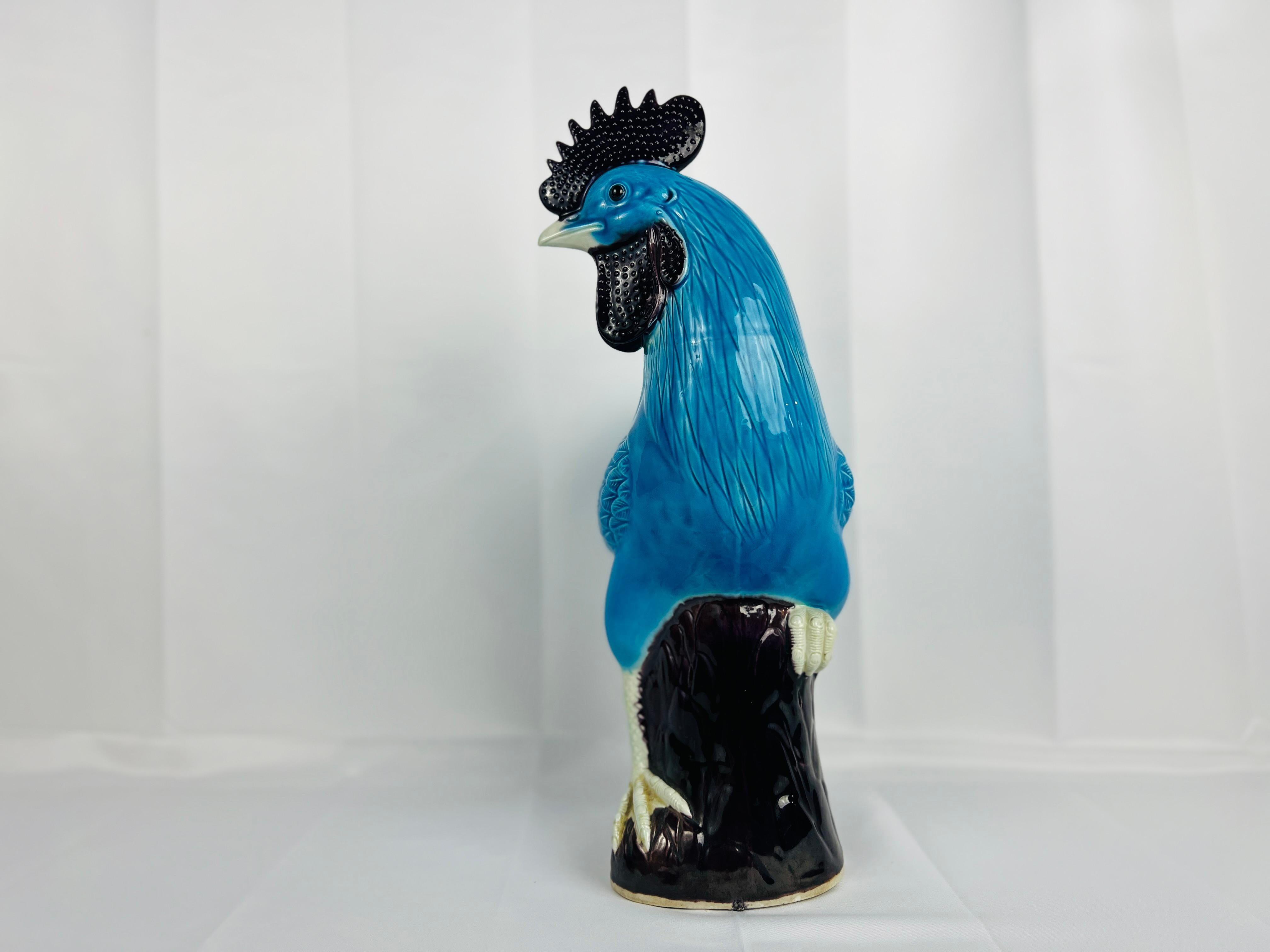 This Large Antique Chinese Export Turquoise Glazed Rooster is a fine example of traditional Chinese ceramic artistry, likely from the Qing Dynasty period or early 20th century. The figure is meticulously hand-sculpted and adorned with a striking