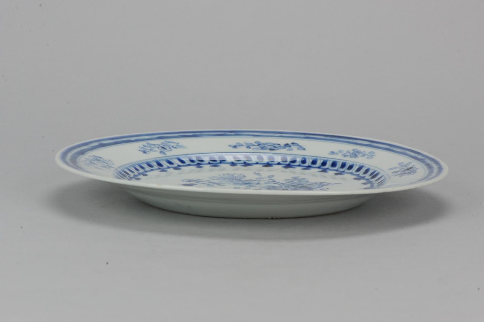 A very nicely decorated plate.

Additional information:
Material: Porcelain & Pottery
Color: Blue & White
Region of Origin: China
Maker: Qianlong (1735-1796)
Period: 18th century Qing (1661 - 1912)
Age: Pre-1800
Original/Reproduction: