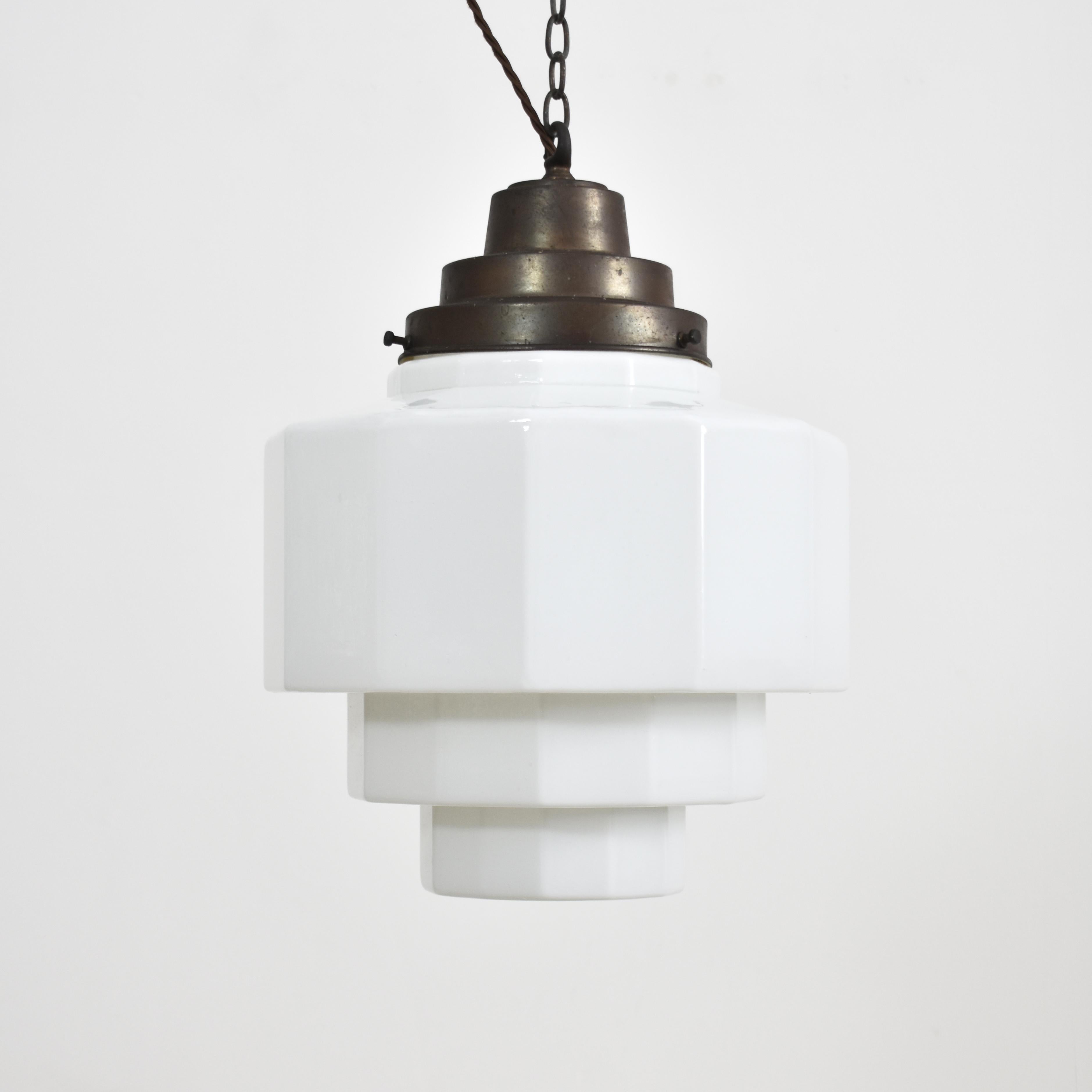 Antique Church Opaline Pendant Light -AD

An original large opaline glass pendant light. The light has a milk glass opaline shade and original pressed brass hanging gallery. The gallery finish has been left untouched in it original condition. The