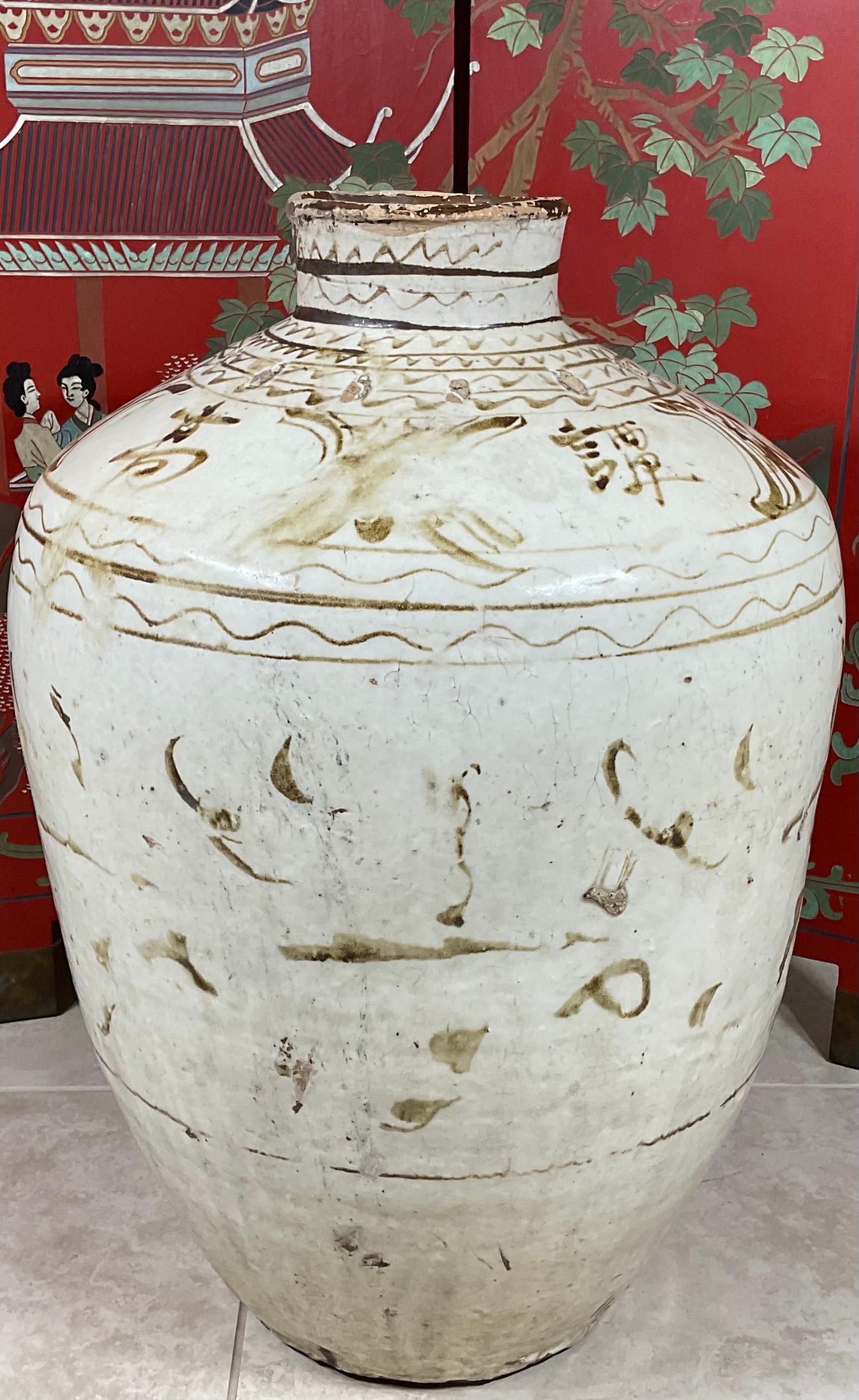 Beautiful stoneware Chinese vessel, hand-painted and glazed, decorated with Chinese motifs or calligraphy like to make exceptional object of art.