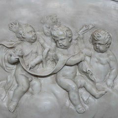 Large and Antique Classical Porcelain Relief Crescent Form Cherub Plaque