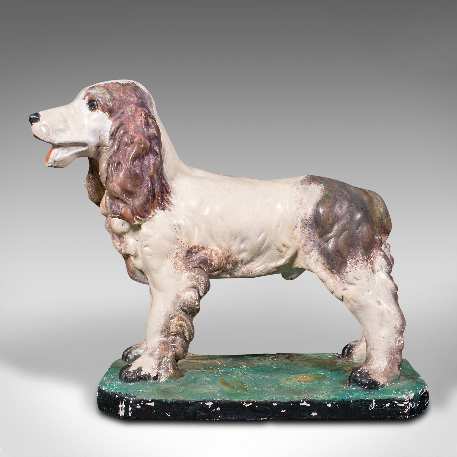 This is a large antique Cocker Spaniel figure. An English, plaster dog statue, dating to the Edwardian period, circa 1910.

Of great proportion and endearing, sure to add character to any room
Displays a desirable aged patina and in good original