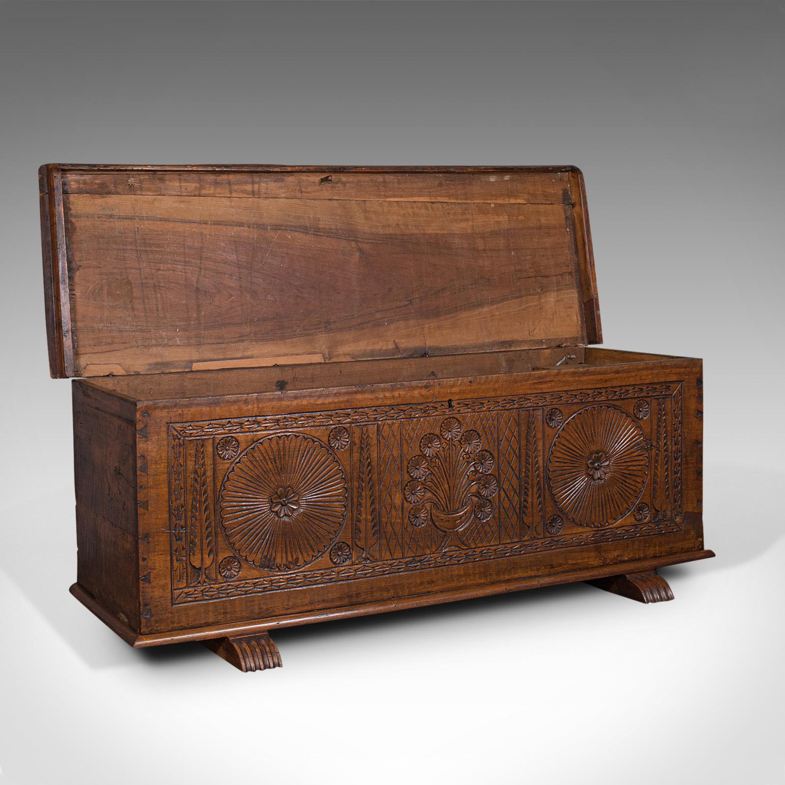 This is a large antique coffer. An Italian, walnut sword chest or linen trunk, dating to the mid 18th century, circa 1750.

Wonderfully carved chest with generous proportion and copious fascination
Displaying a desirable aged patina and good