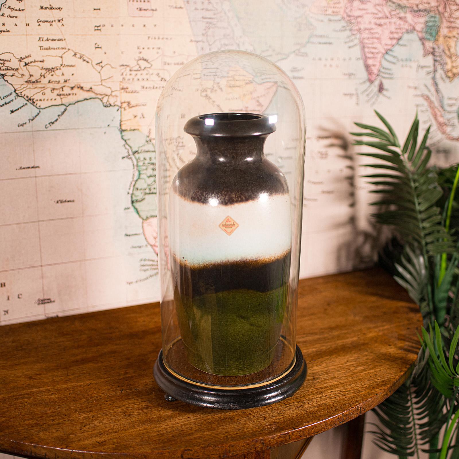 
This is a large antique collector's dome. An English, glass and ebonised mahogany taxidermy or specimen showcase, dating to the Victorian period, circa 1870.

Appealing Victorian example, with ideal proportion for desk or mantle display
Presenting