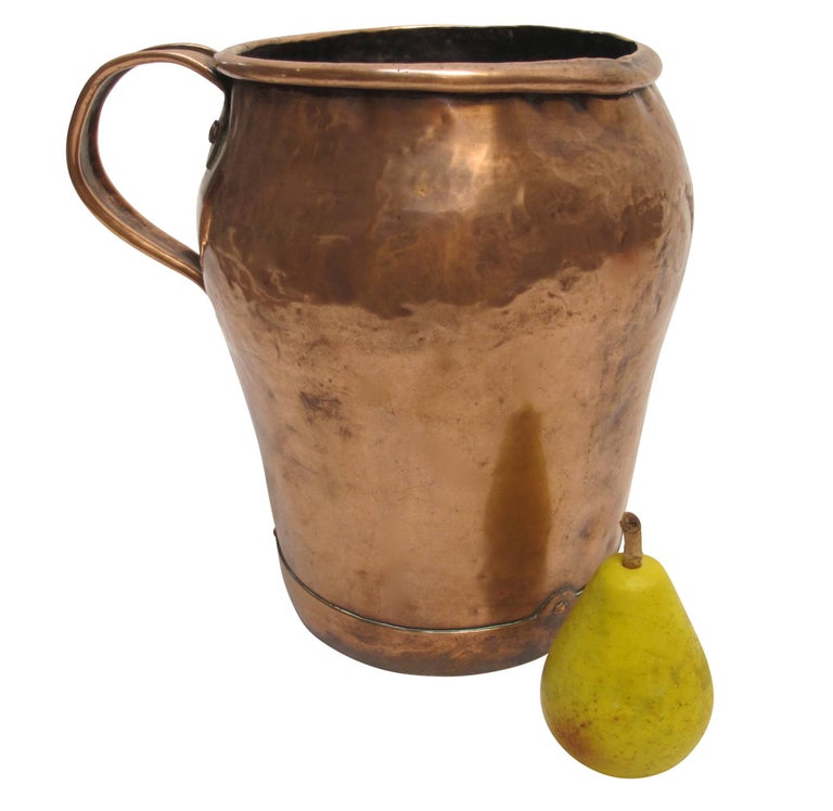 Large handmade copper jug or measure. Shows wonderful character of use and age. Continental (possibly French), late 18th-early 19th century.