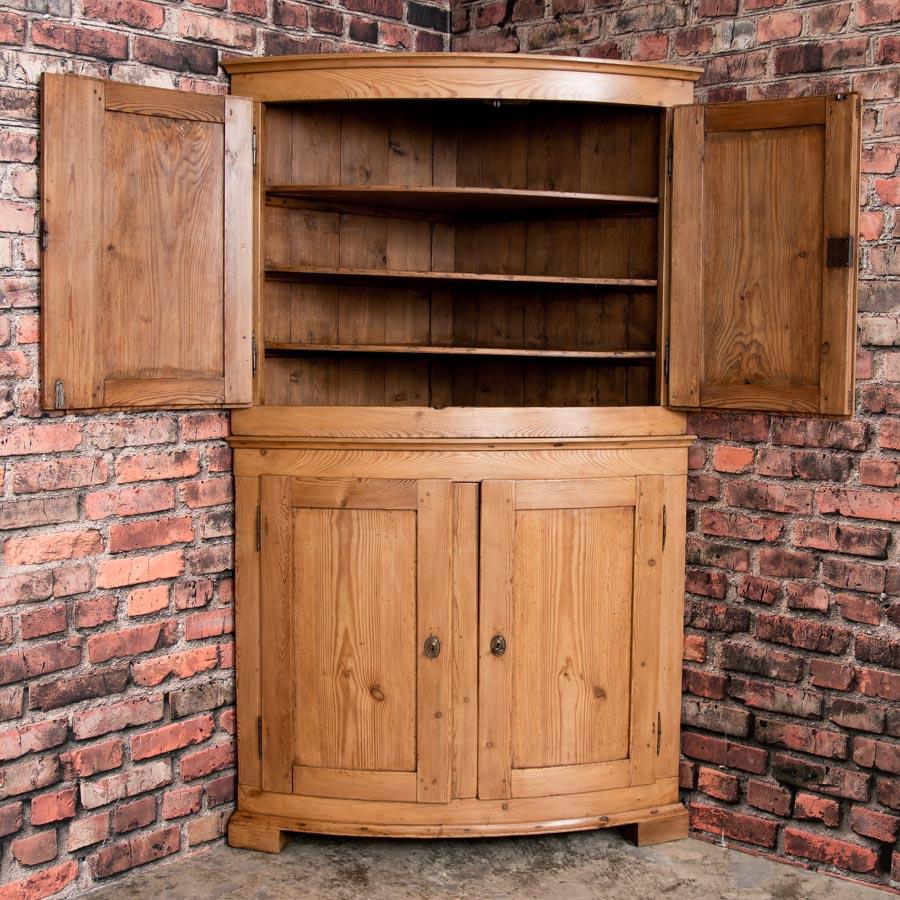 bow front corner cabinet
